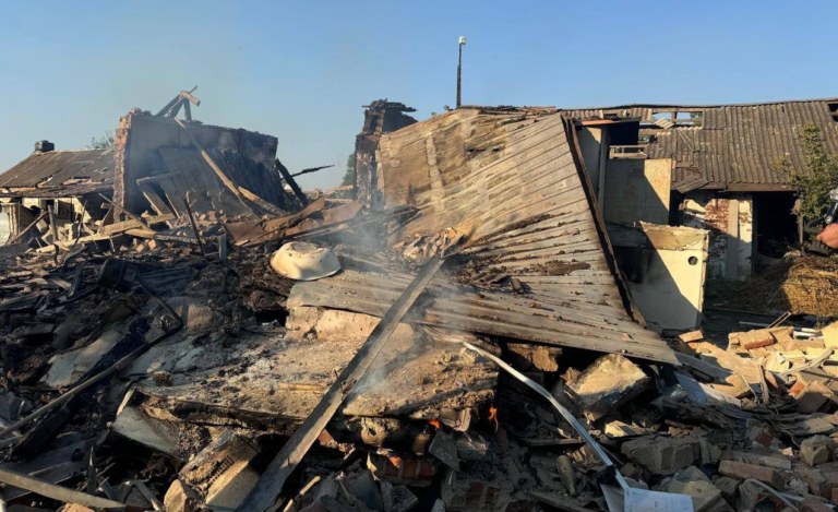 Russians strike village council building in Kharkiv region with artillery, trapping people under rubble