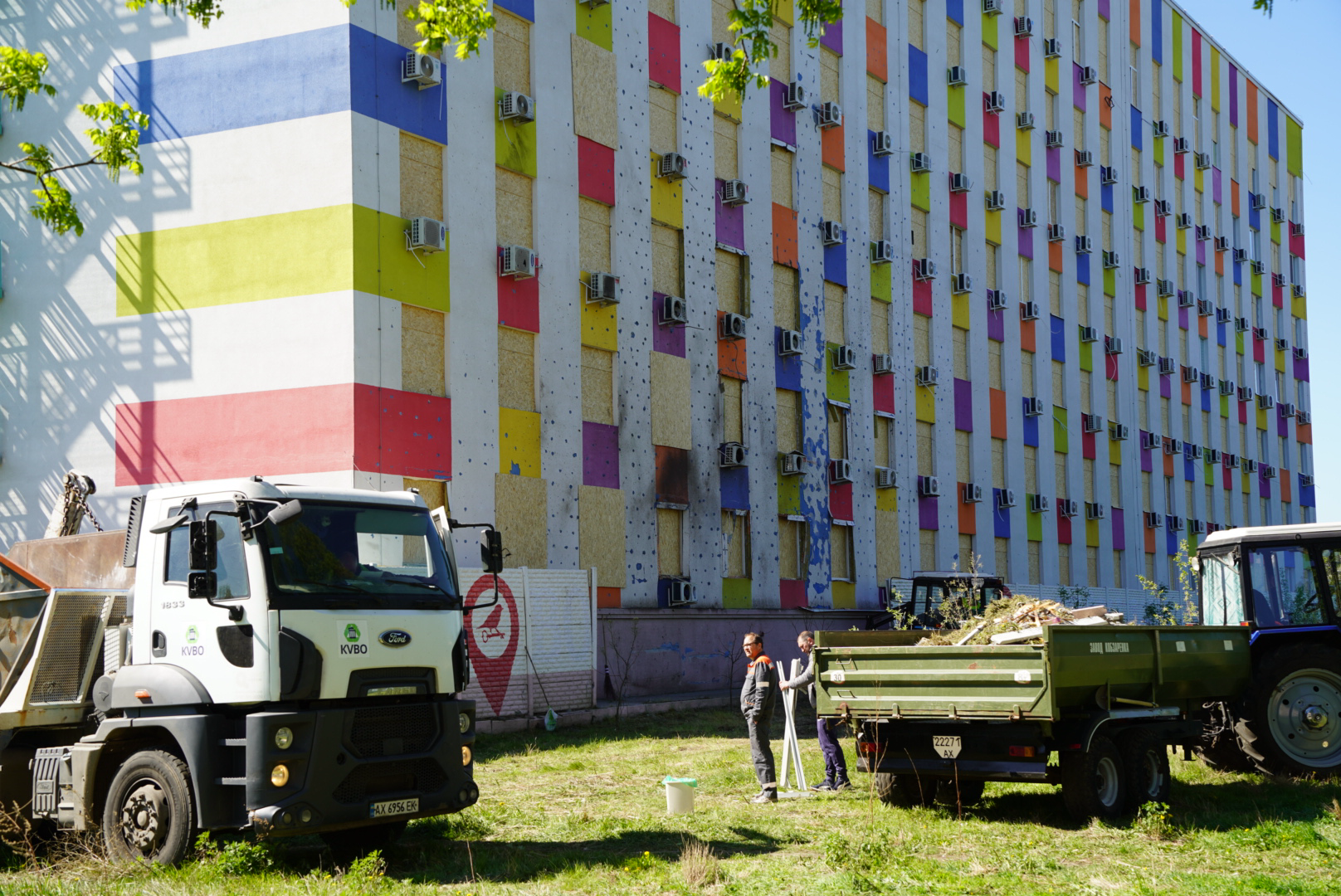 Municipal workers the morning after Russian attack on Kharkiv's Saltivskyi district on May 2, 2025