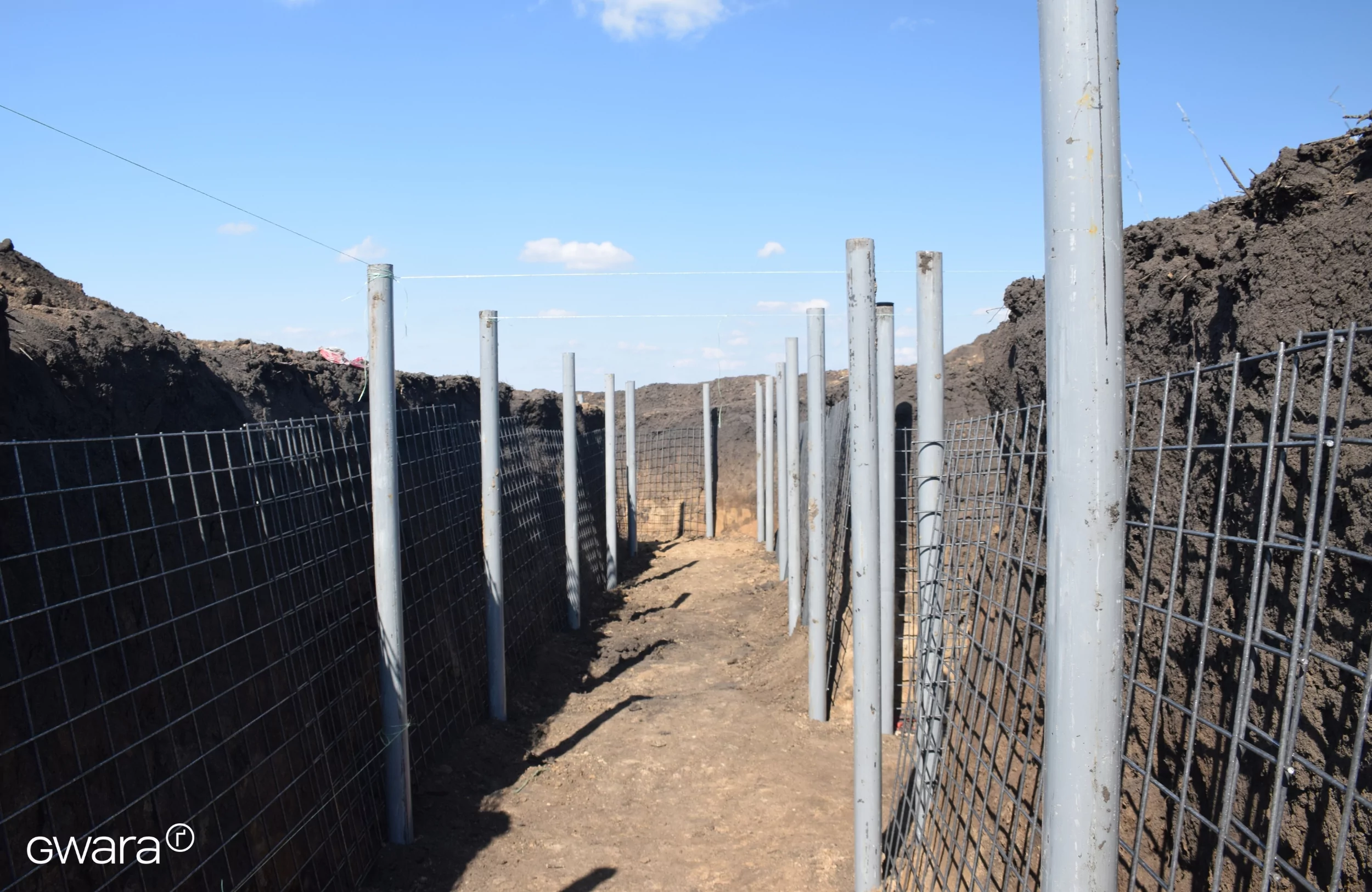зображення до посту: In Photos: Trenches, Underground Paths, and Concrete Shelters. How Fortification Building Looks Like in Kharkiv Oblast