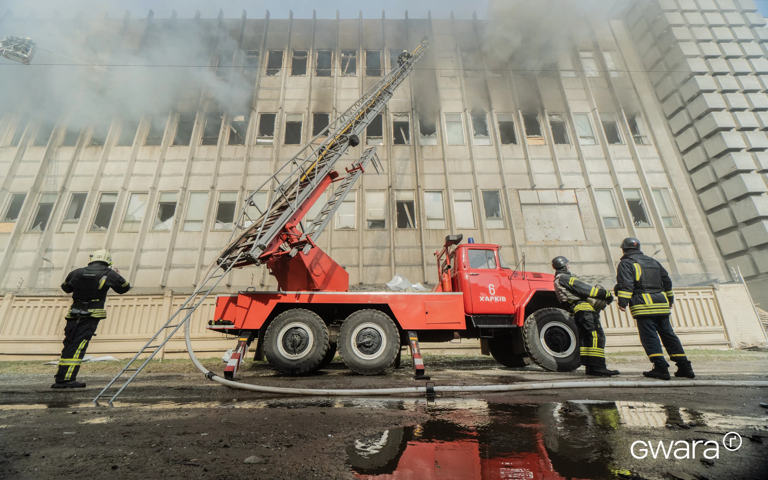 зображення до посту: In Photos: Russian Army Fires Missile at Civilian Enterprise in Kharkiv, Killing Three People