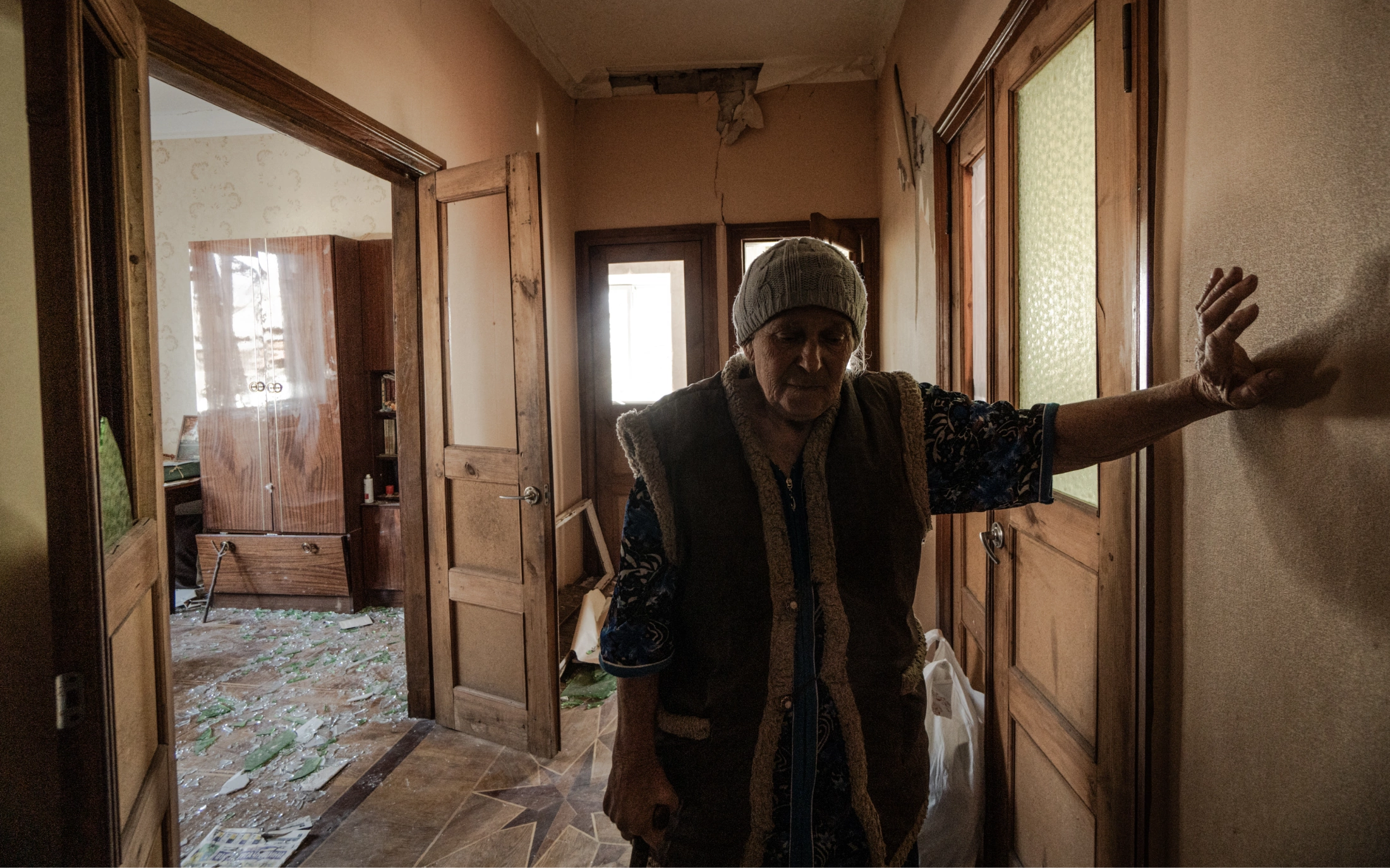Vira, one of the residents of Velyki Prokhody, Kharkiv region, in her house, damaged by Russian aerial bomb on April 11, 2024 / Photo: Ivan Samoilov for Gwara Media