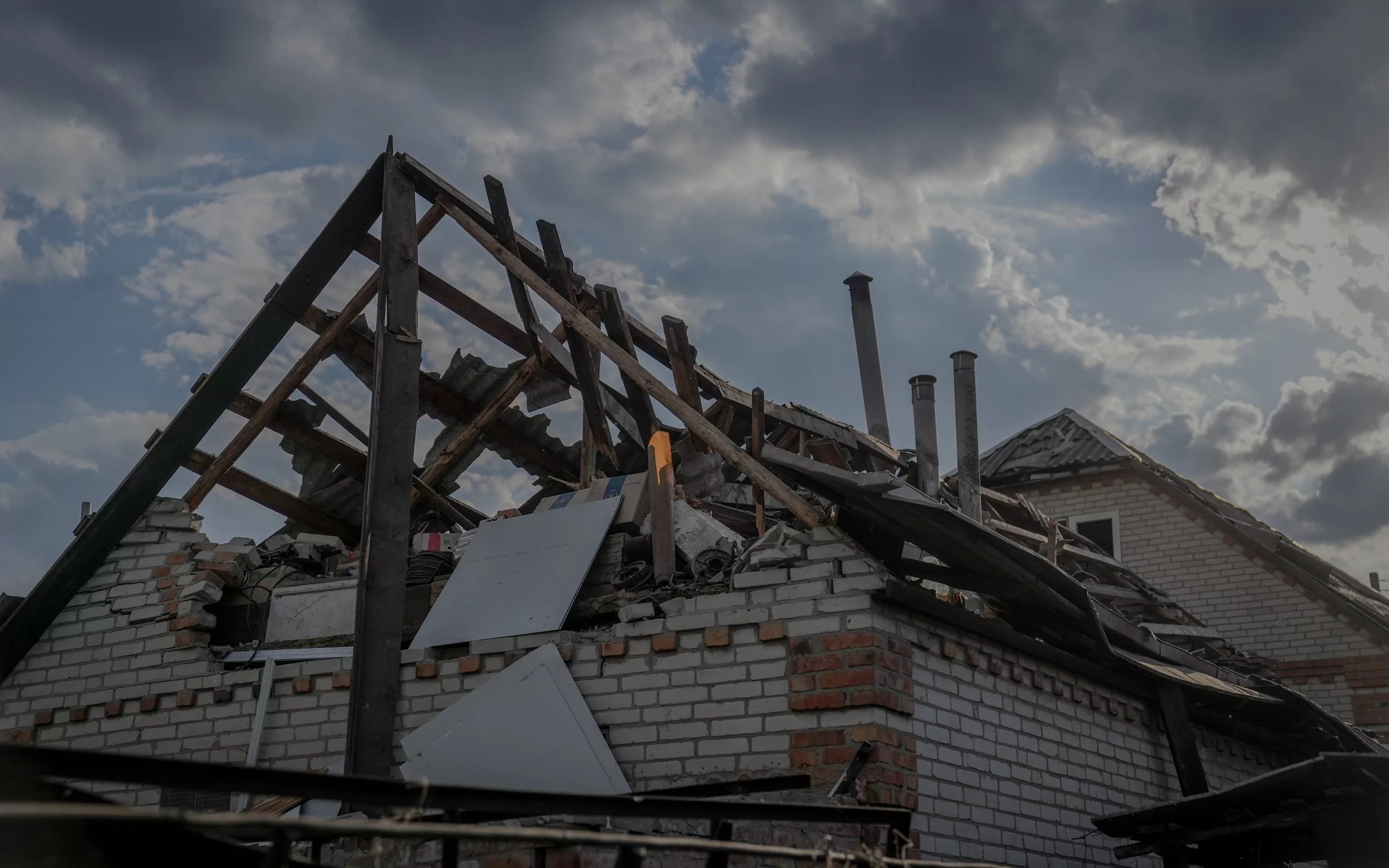зображення до посту: In photos: Russian army drops bombs on sports complex in Kharkiv Oblast, injures 9 people, including 8 children  