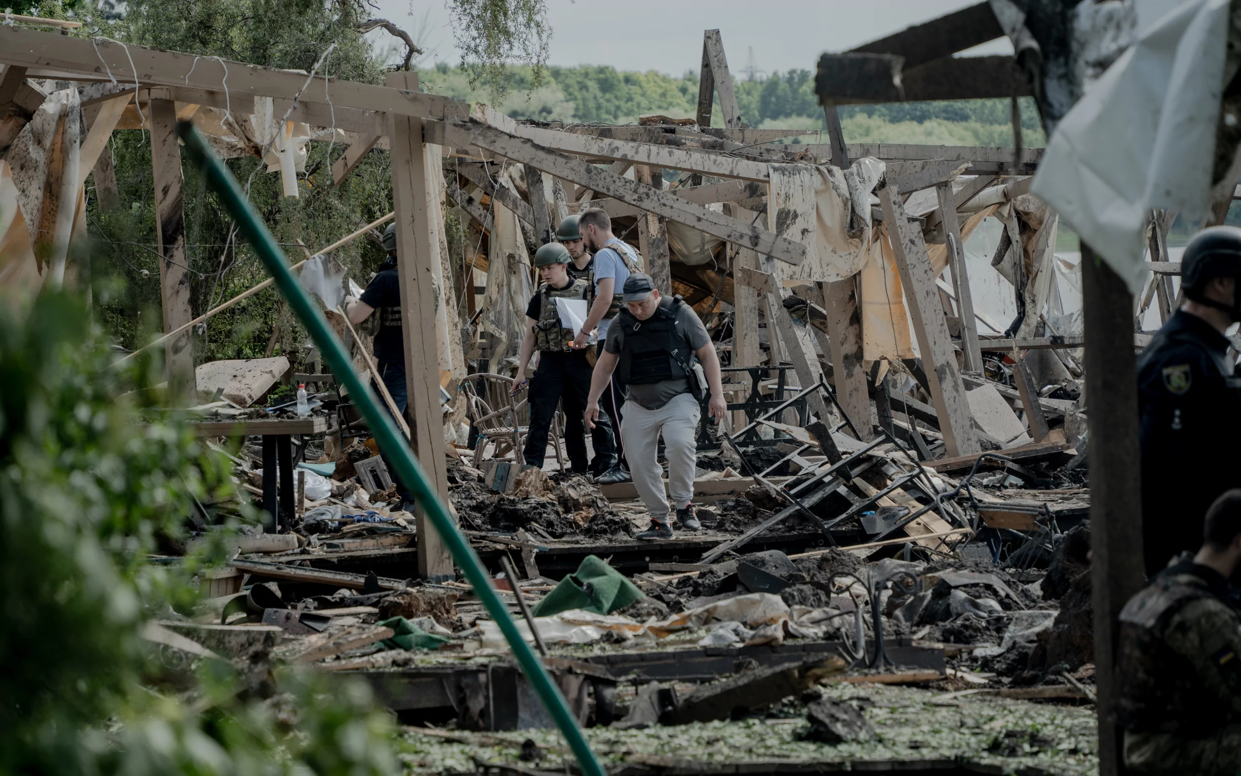 зображення до посту: In photos: Russia hits recreation center in Kharkiv suburbs with double-tap attack, kills 6, including pregnant woman, injures 27