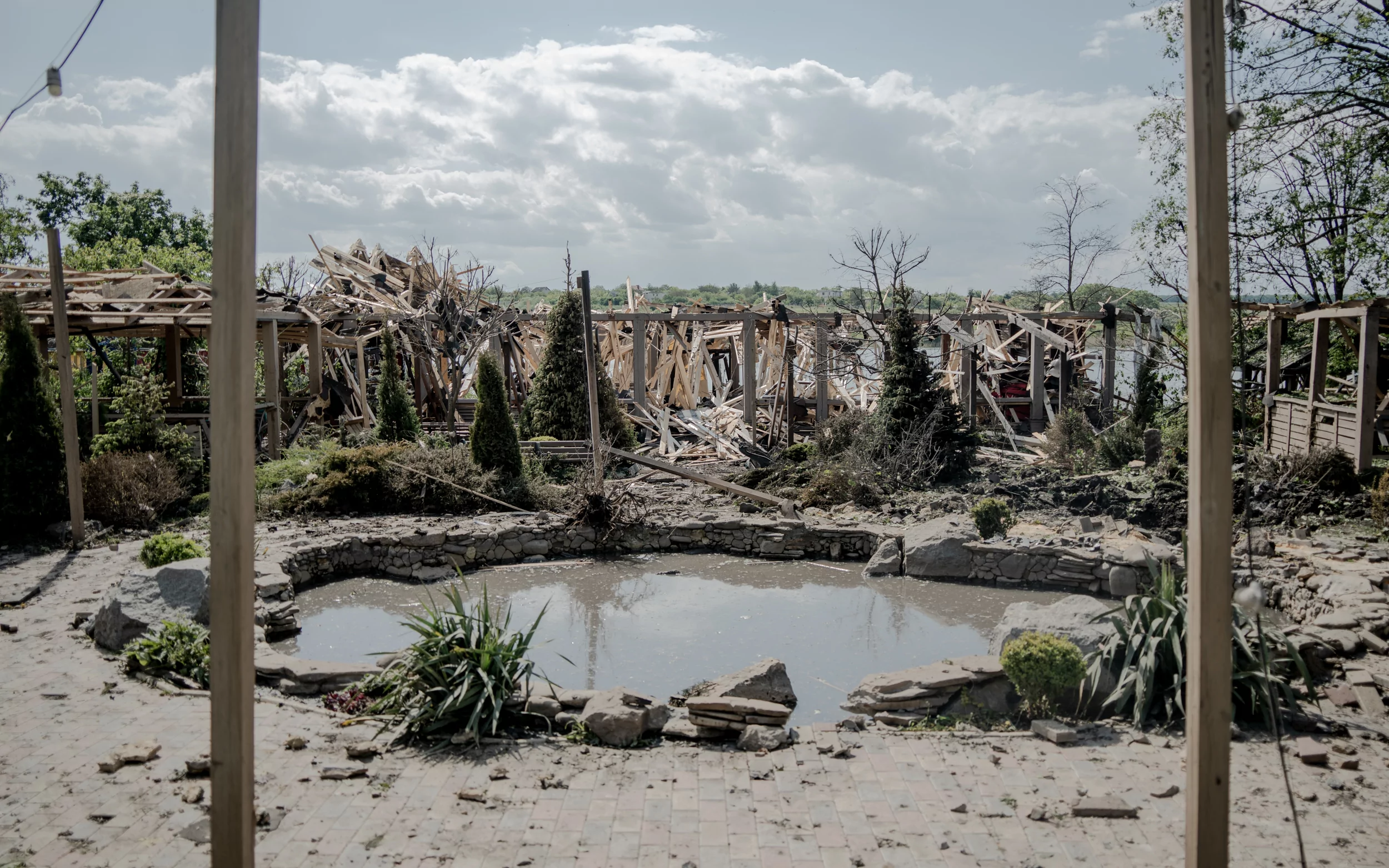An aftermath of Russian double-tap strike on a recreation center in a village in Kharkiv suburbs on May 19, 2024. / Ivan Samoilov for Gwara Media