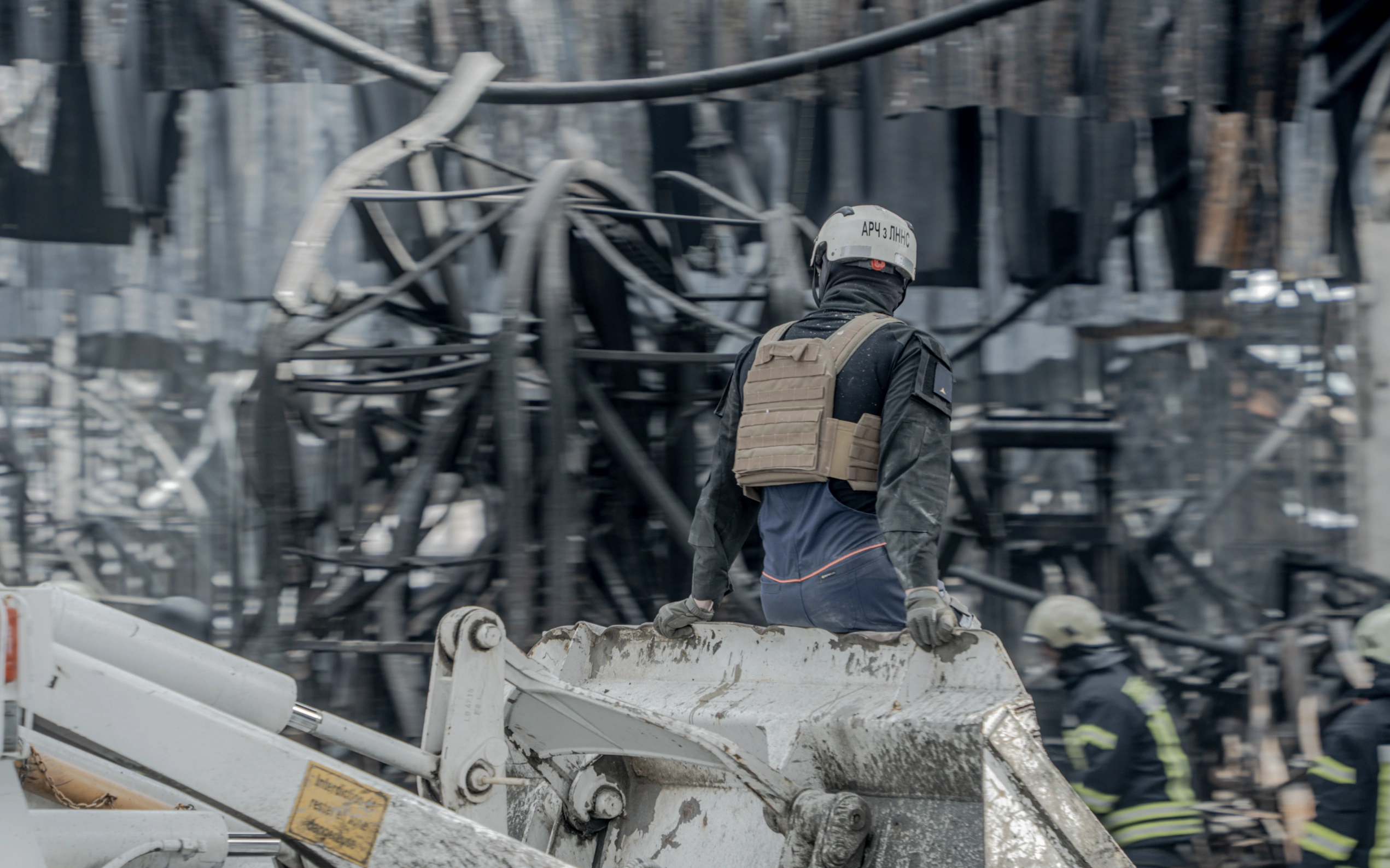 зображення до посту: In Photos: Aftermath of Russian attack on hypermarket in Kharkiv, which killed 18, including 12 and 17-year-old, injured 48  