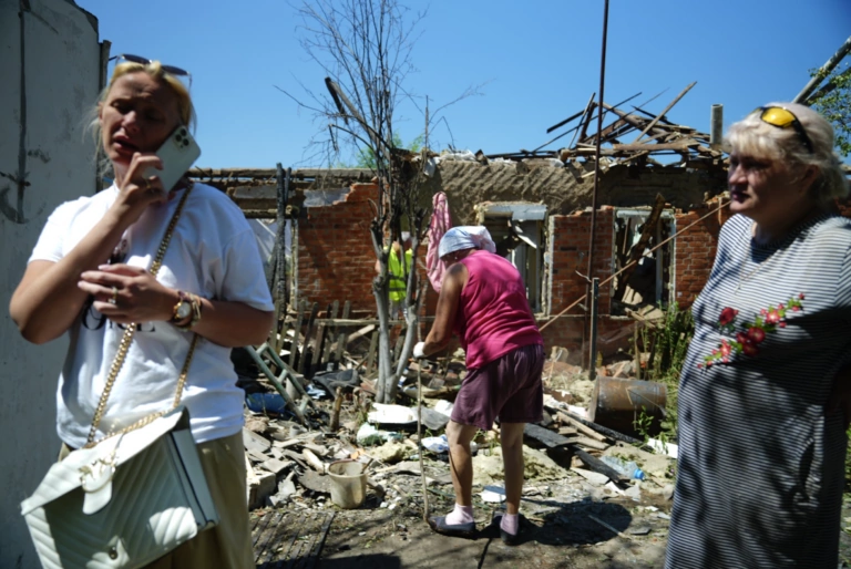Russian shell fragments cause house to catch fire in Kharkiv, injure 2 (in photos)