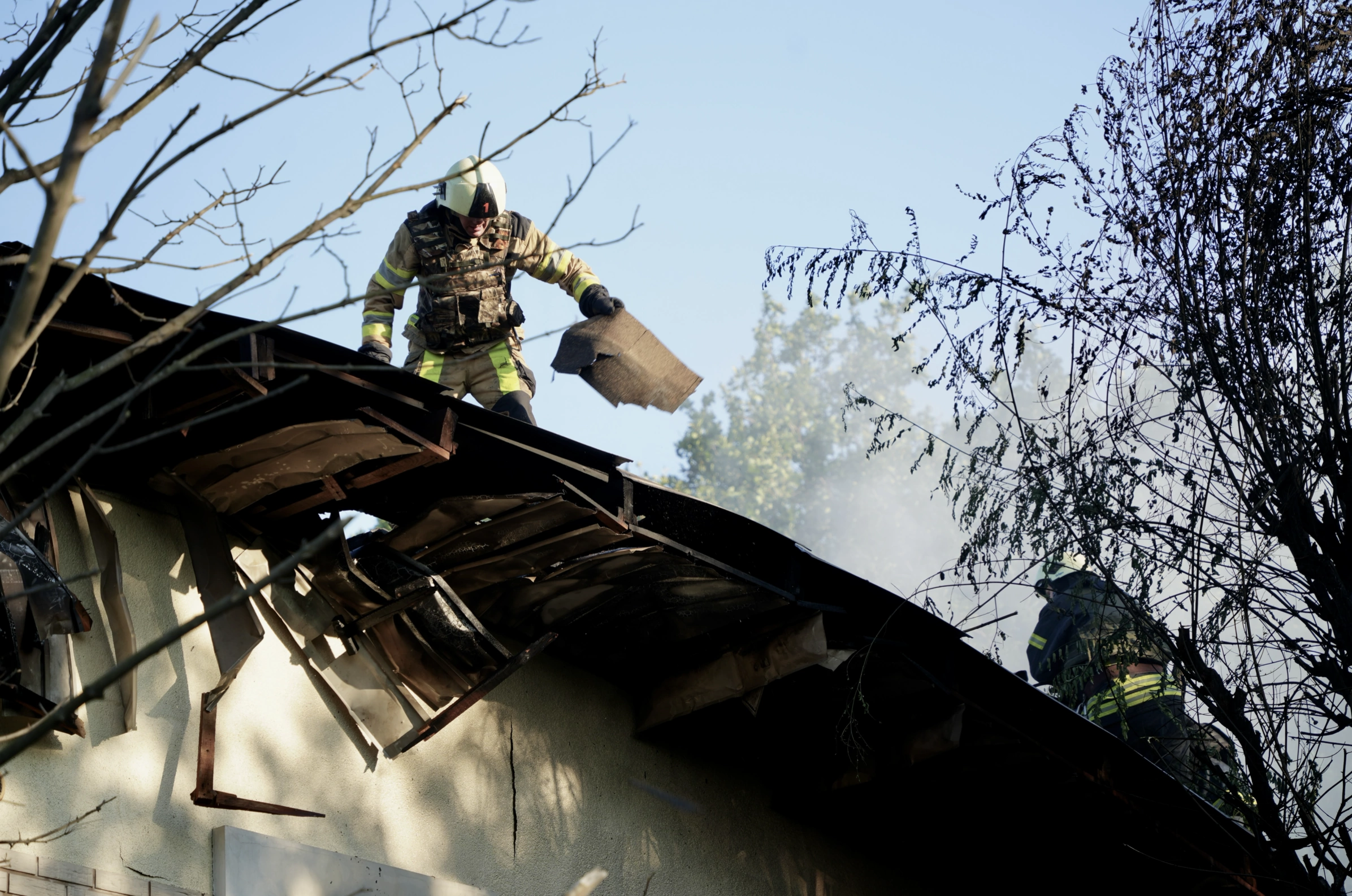 зображення до посту: In photos: Russians drop glide bomb on volunteer&#8217;s house in Kharkiv, injure 3 