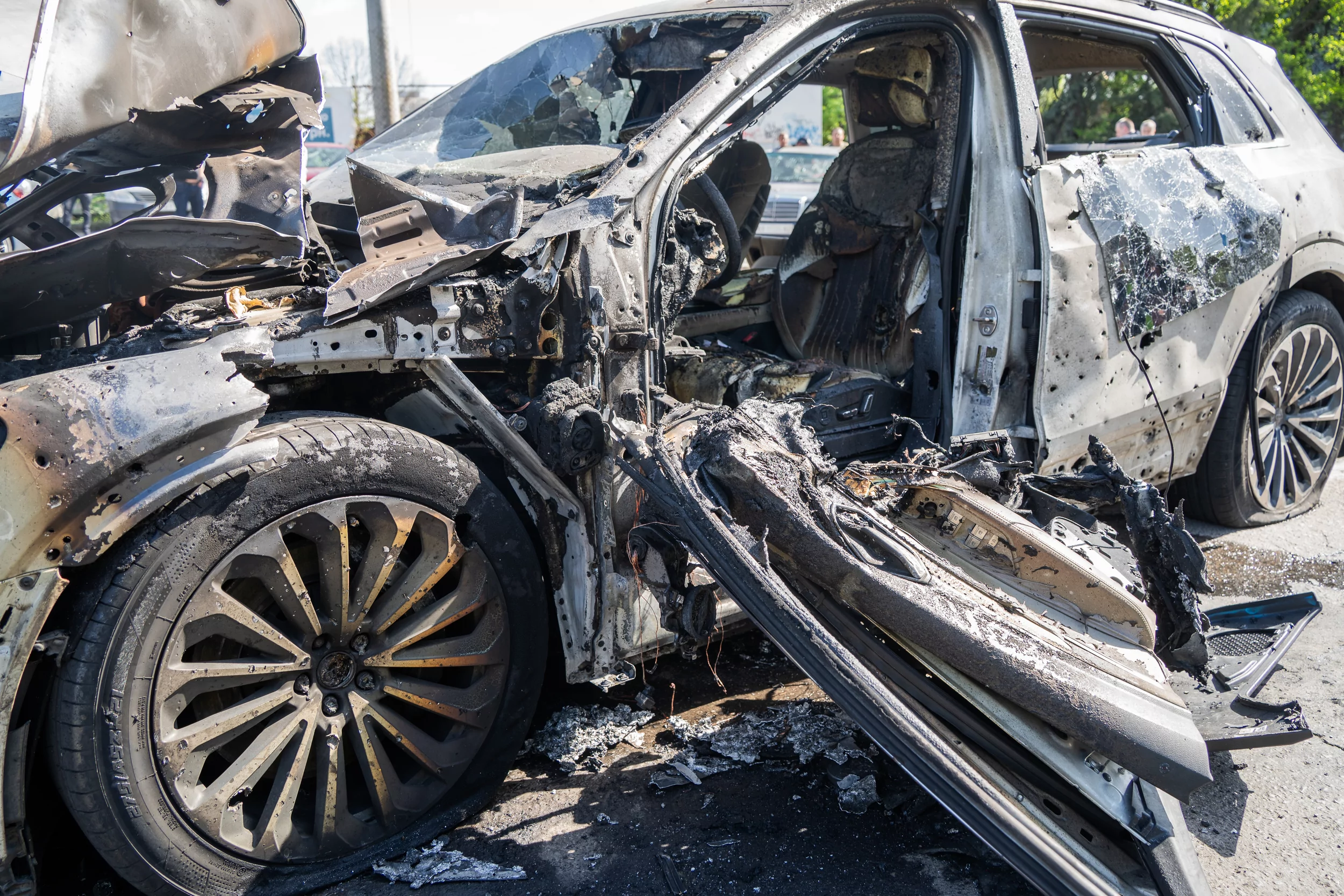 Car that caught fire after Russian attack