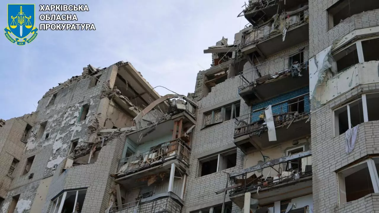 Damaged apartment building in Kupiansk