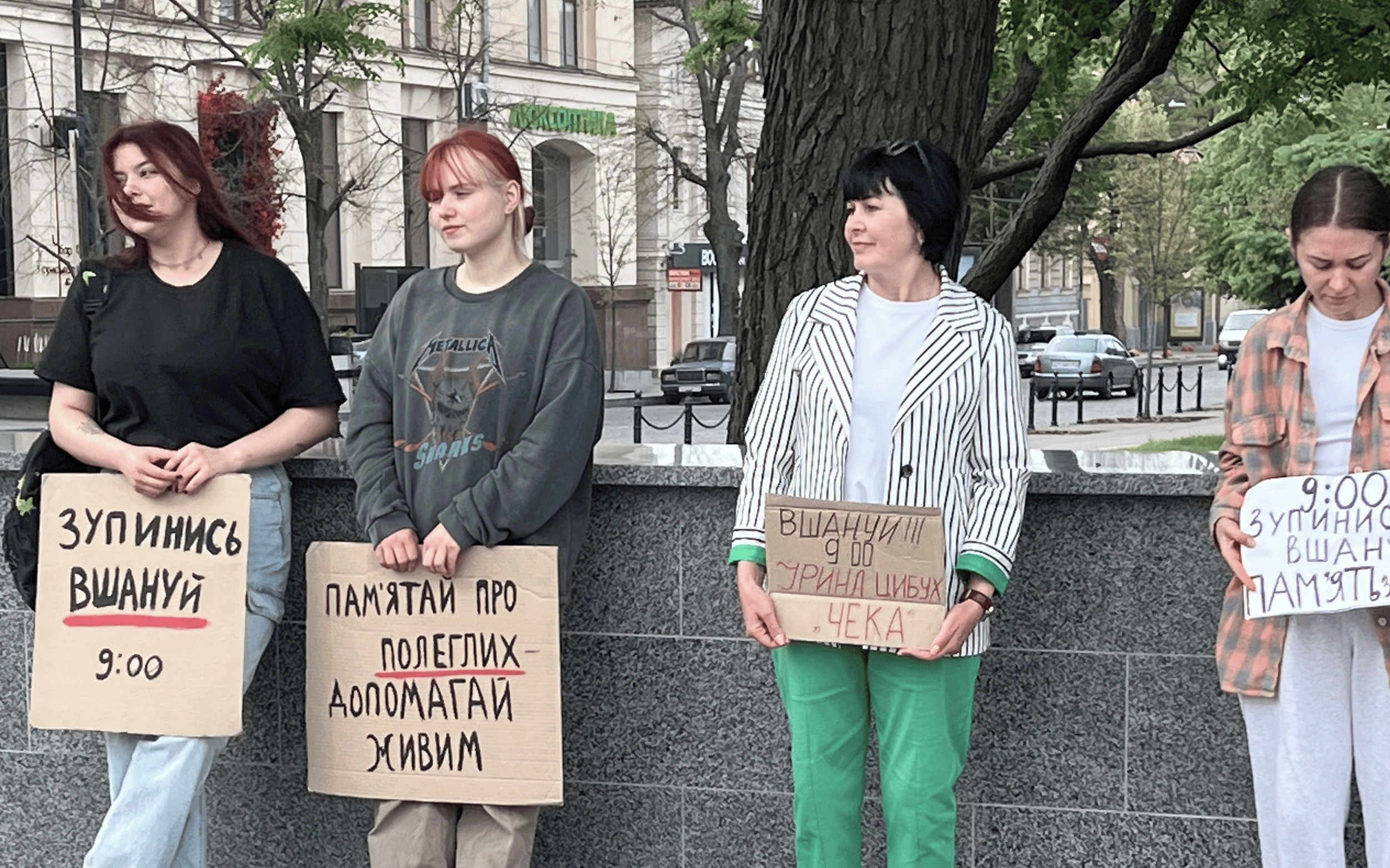 Participants of moment of silence in honor of Iryna Tsybukh, the call sign “Cheka,” in Kharkiv on May 29