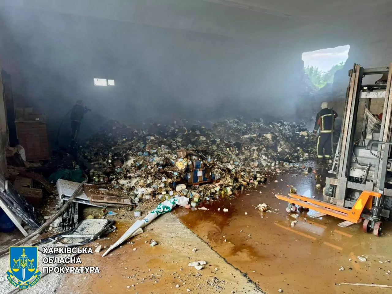 Damaged storage with humanitarian products after Russian attack in Izium district on May 30