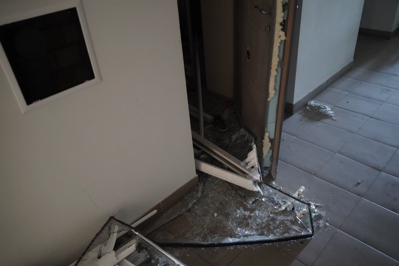 Doors, blown off the hinges by an explosion of Russian kamikaze drone in Saltivskyi district of Kharkiv on May 2