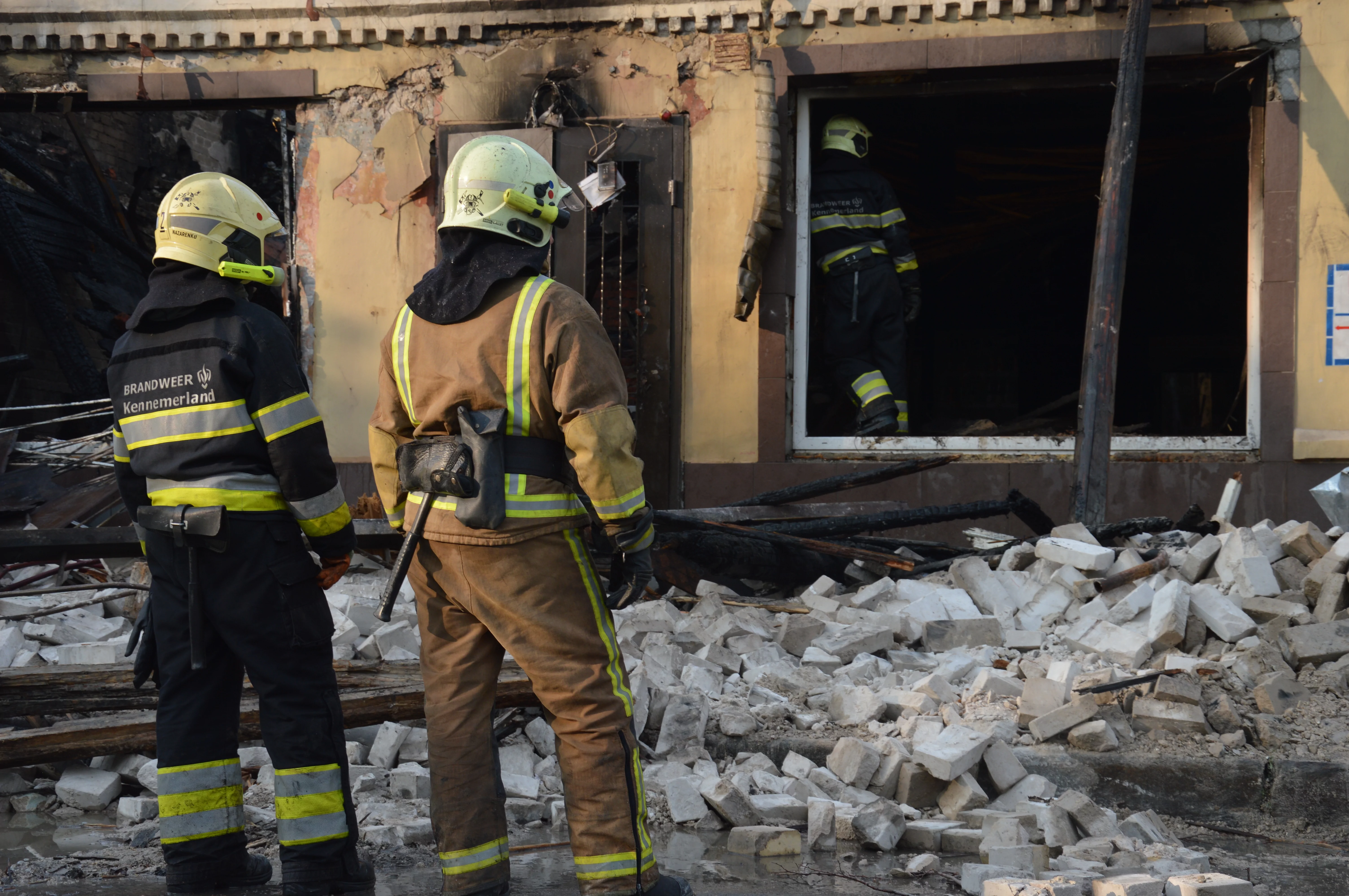 Emergency service members on the impact site / Photo: Yulia Gush