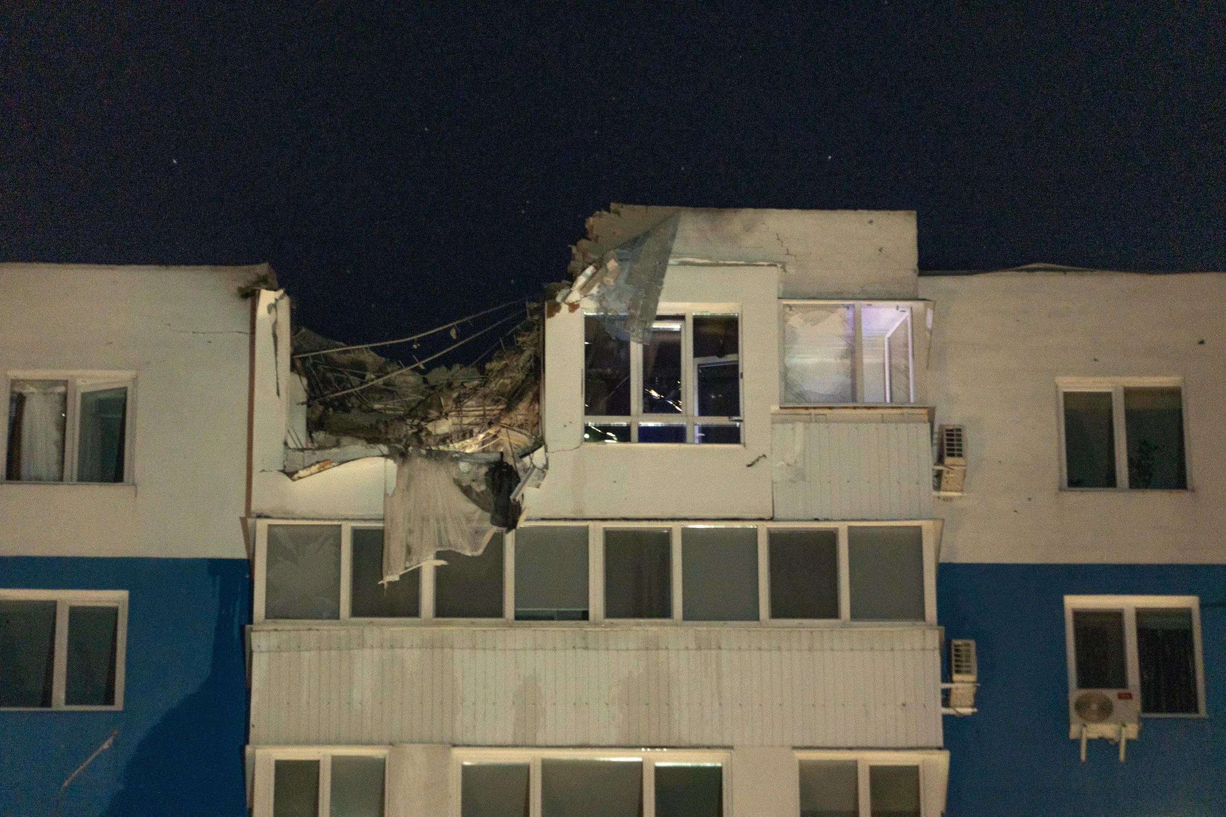 Damaged high-rise apartment building after Russian attack in Slobidskyi district on June 5