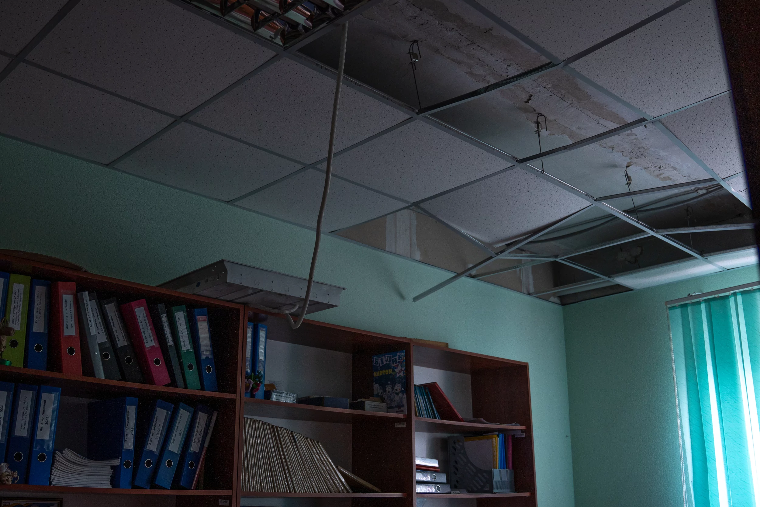 Damaged library after Russian drone attack on Derhachi on June 30