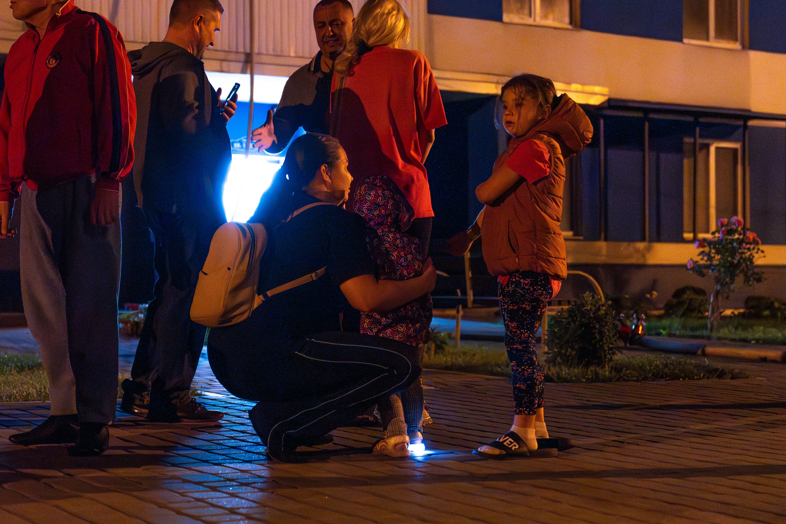 Residents of damaged apartment building after Russian attack in Slobidskyi district on June 5