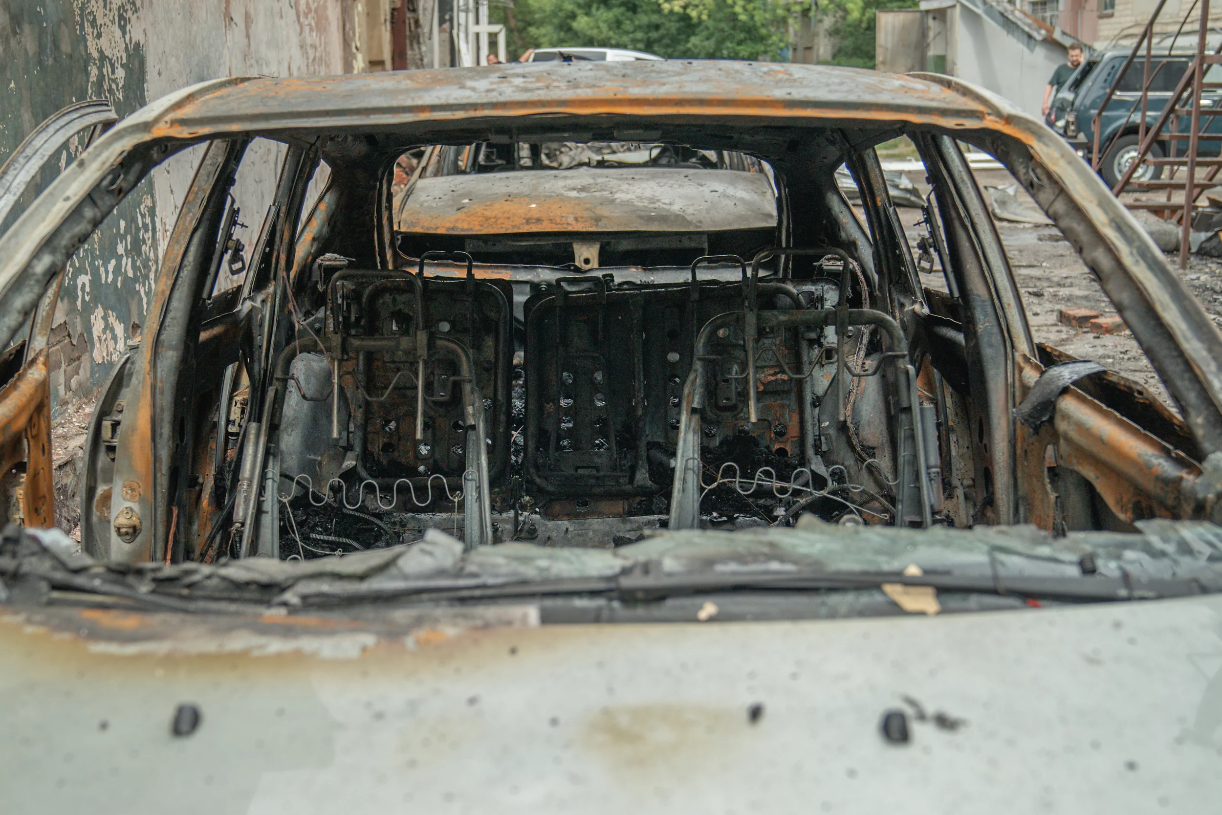 Car that burned down after the overnight Russian drone attack on Kharkiv on Jul 30, 2025