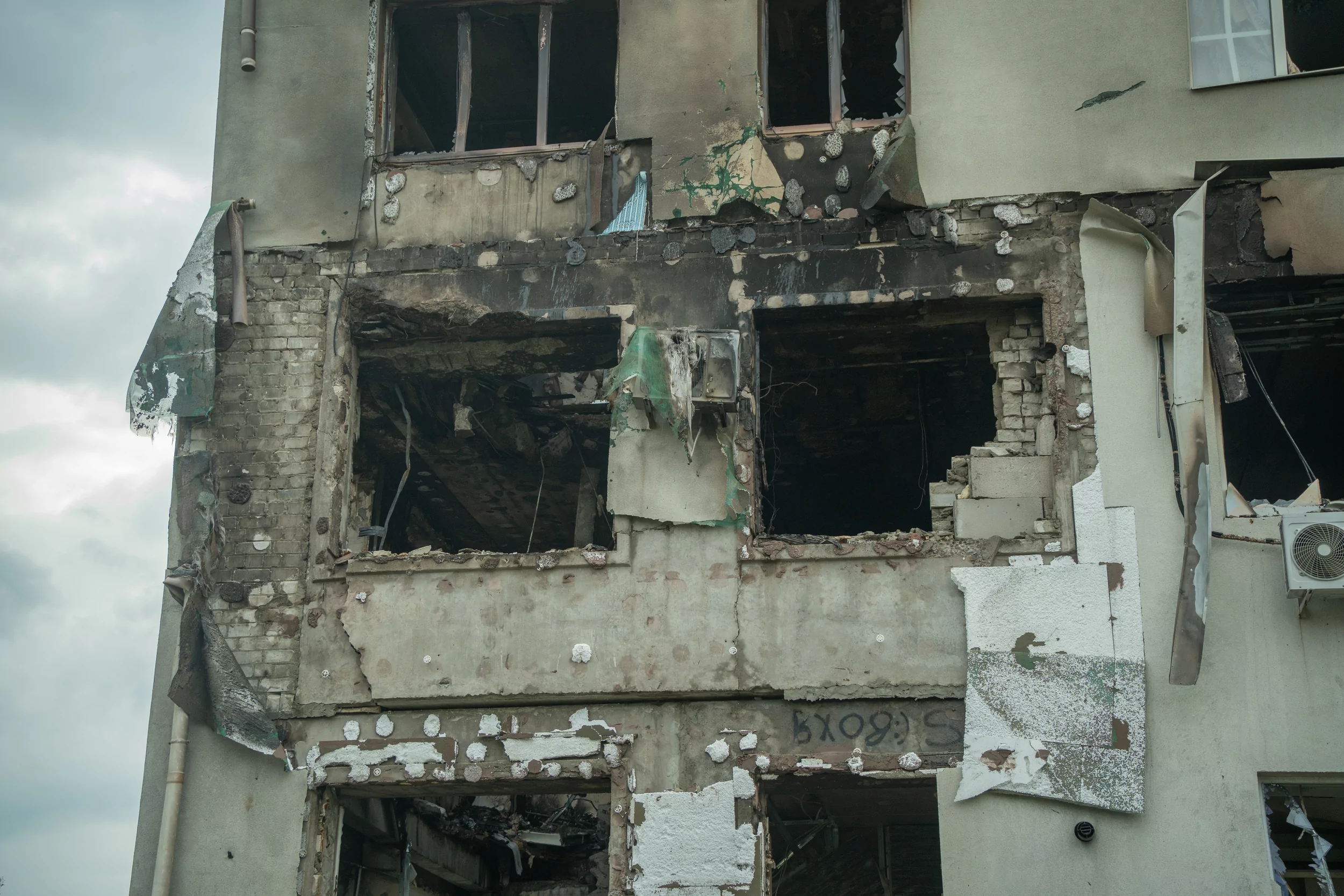 Windows in a flat, burnt down in a fire in the aftermath of Russian drone attack on Kharkiv on Aug. 18, 2025