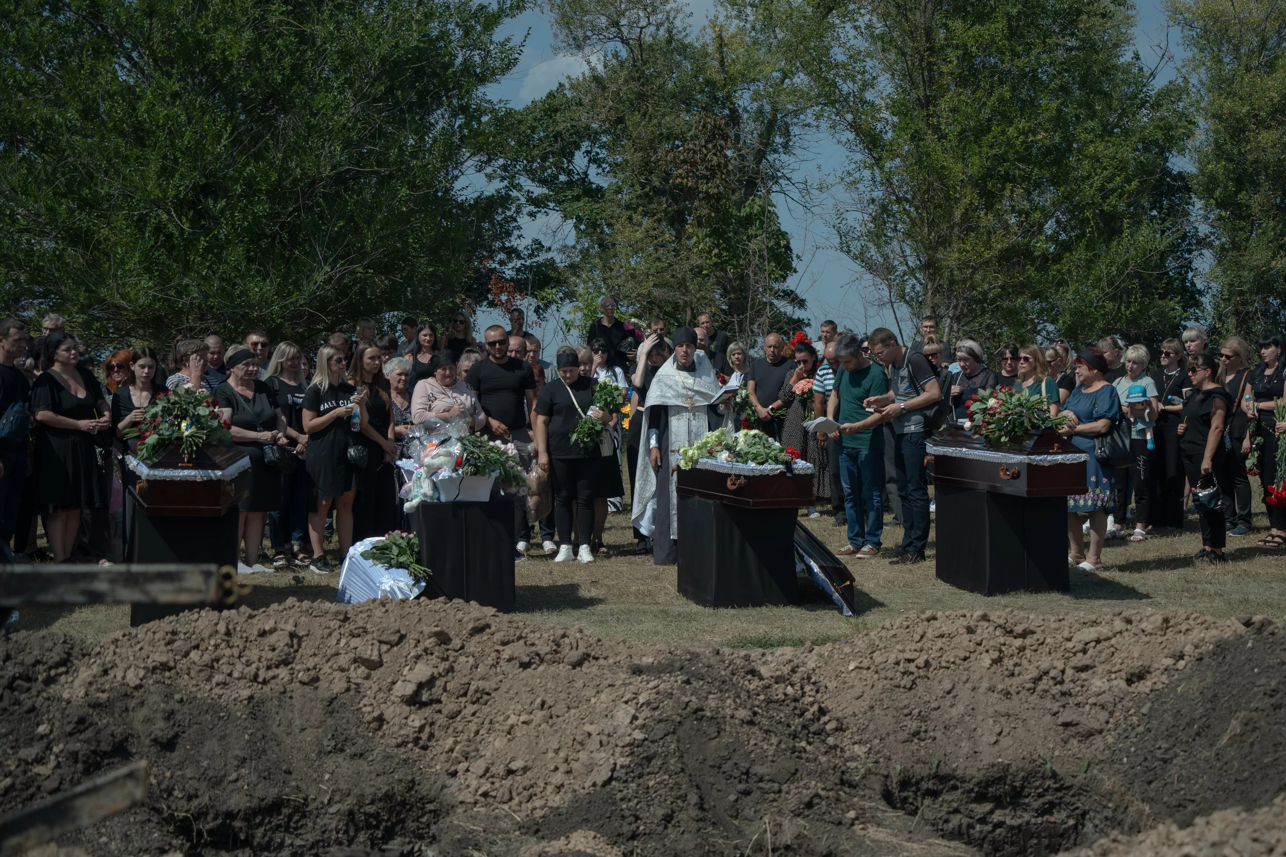 On August 21, the family killed by Russia was buried in Kharkiv