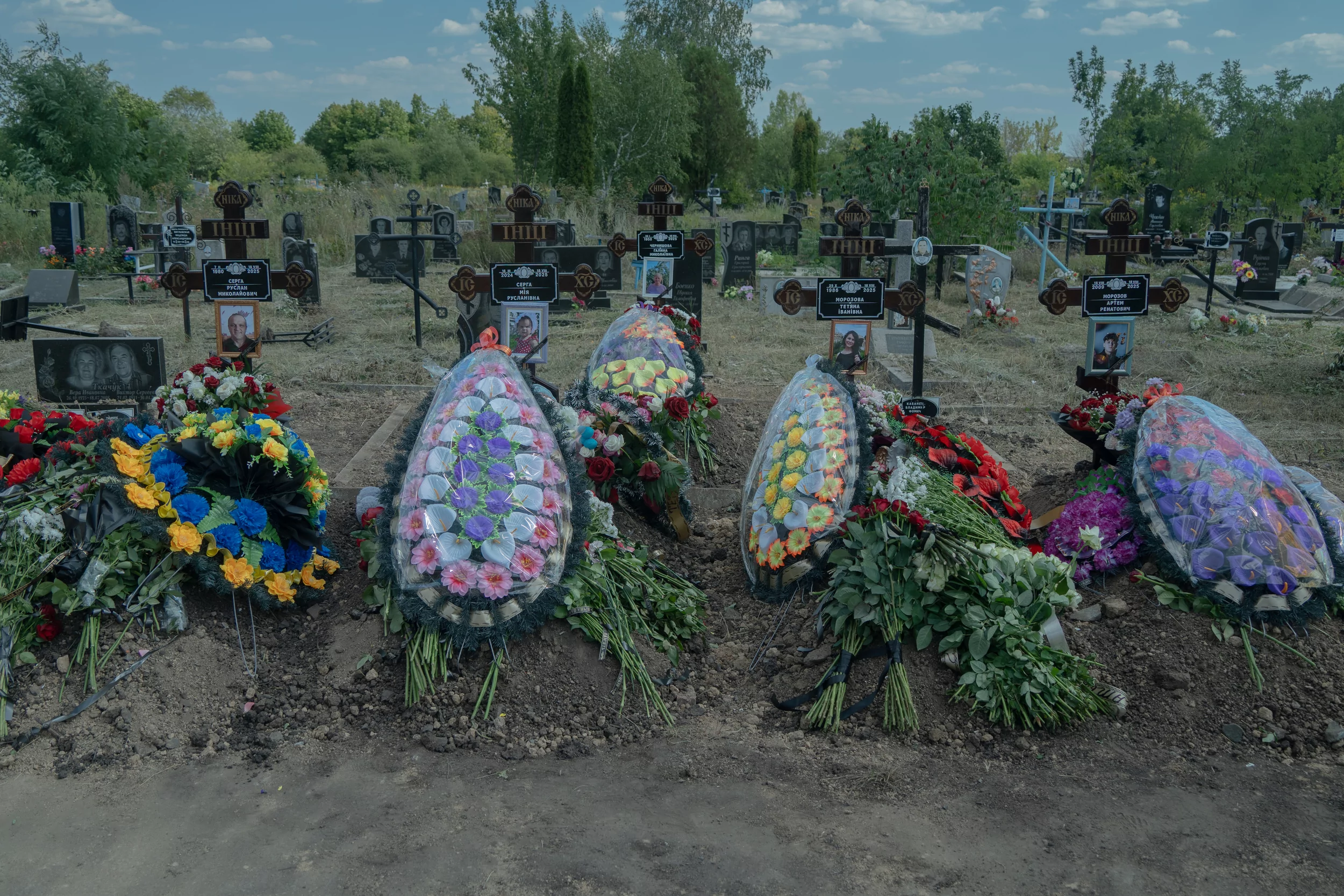 On August 21, the family killed by Russia was buried in Kharkiv