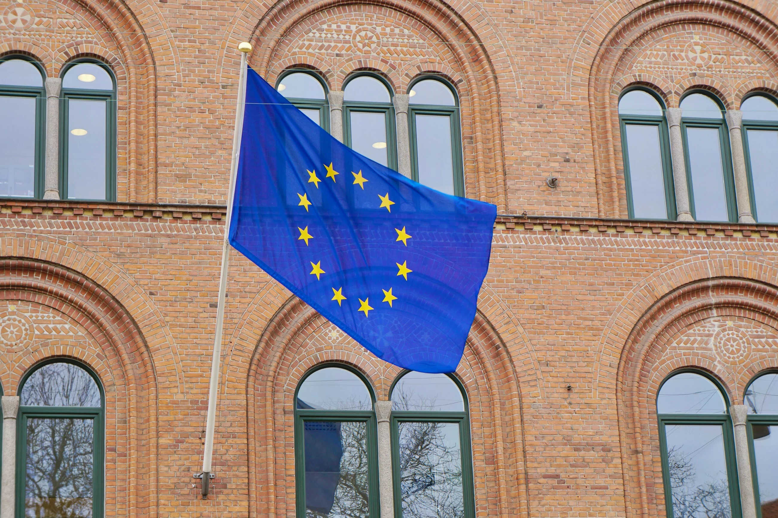 European flag flying in Copenhagen, Denmark / Photo: Unsplash, Antoine Schibler