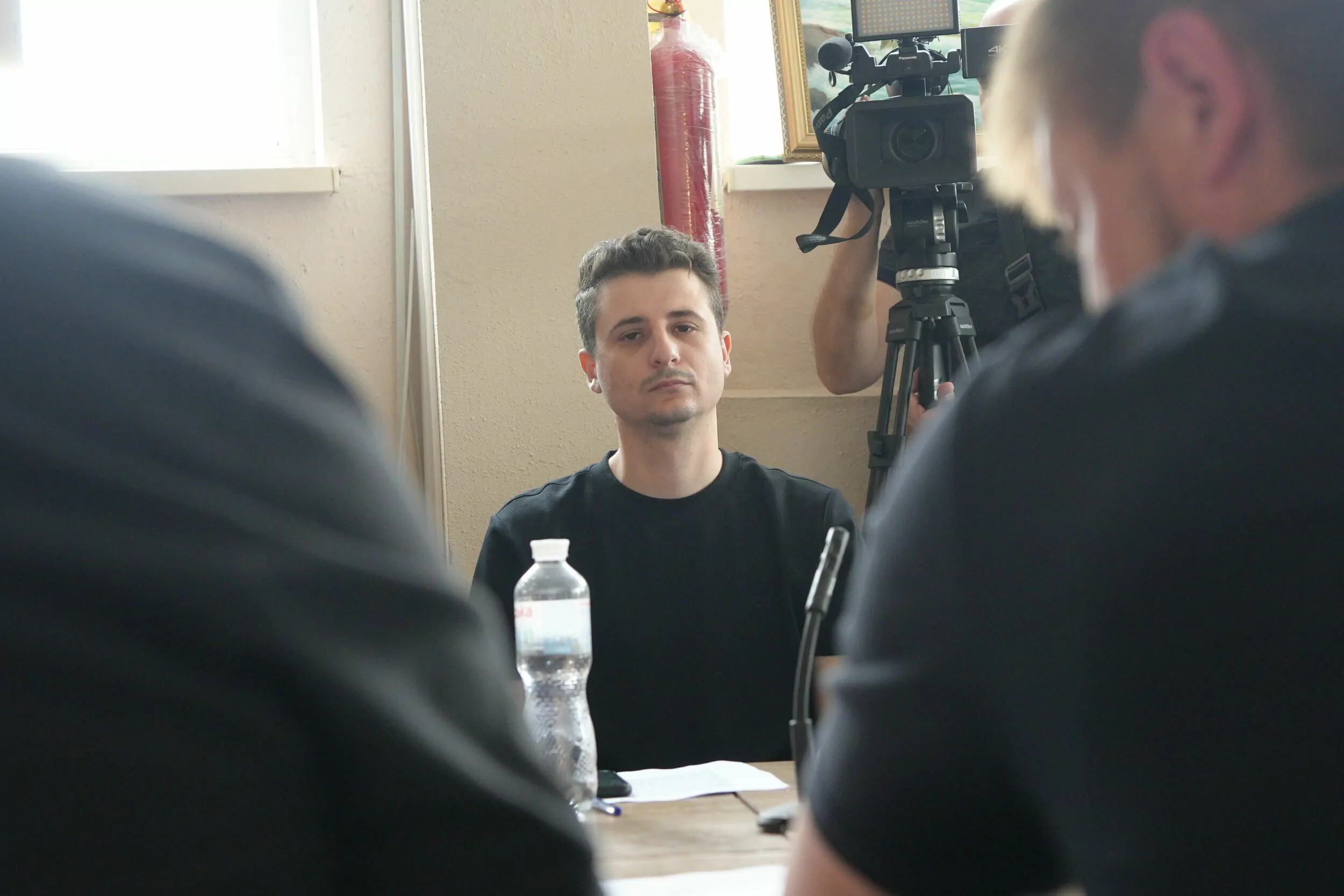 Yurii Fediai, a teacher, who was beaten by Serhii Volovyk, an employee of Kharkiv recruitment center, during the second court hearing on Jun. 16