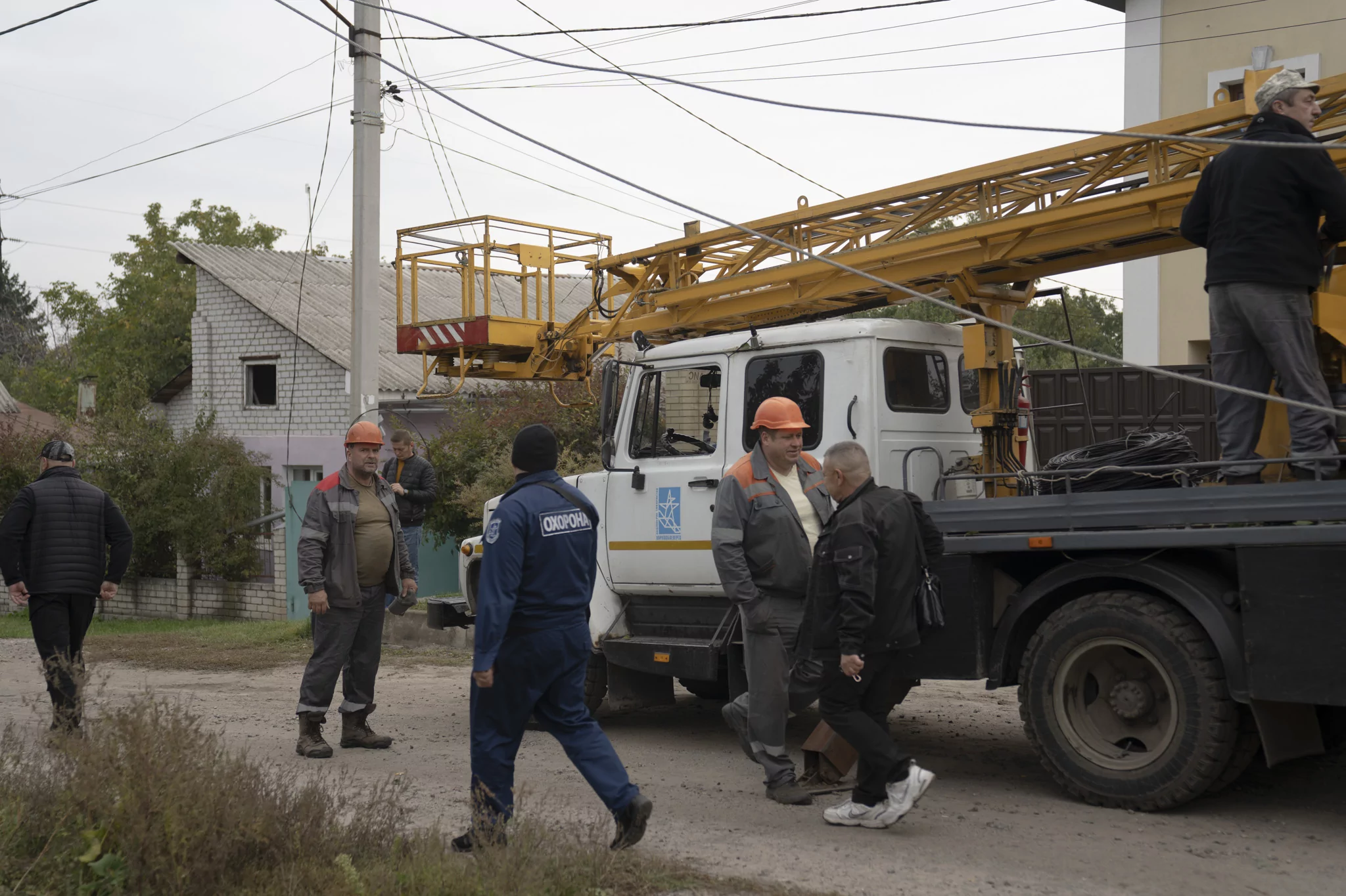 Municipal workers are repairing the consequences of the Russian attack on the Novobavarskyi district of Kharkiv on Oct. 5