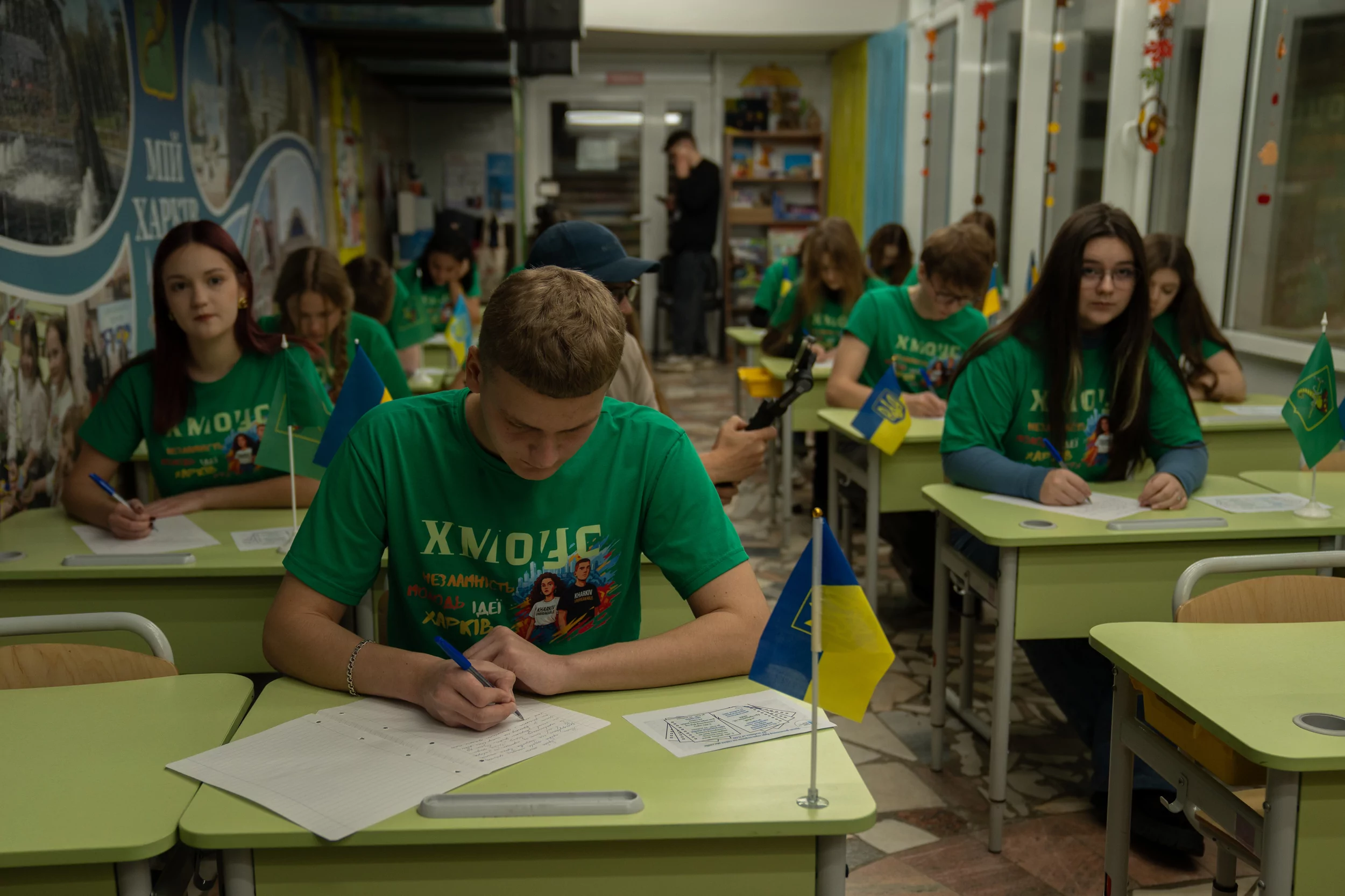 Pupils at the Kharkiv underground school in subway writes a dictation