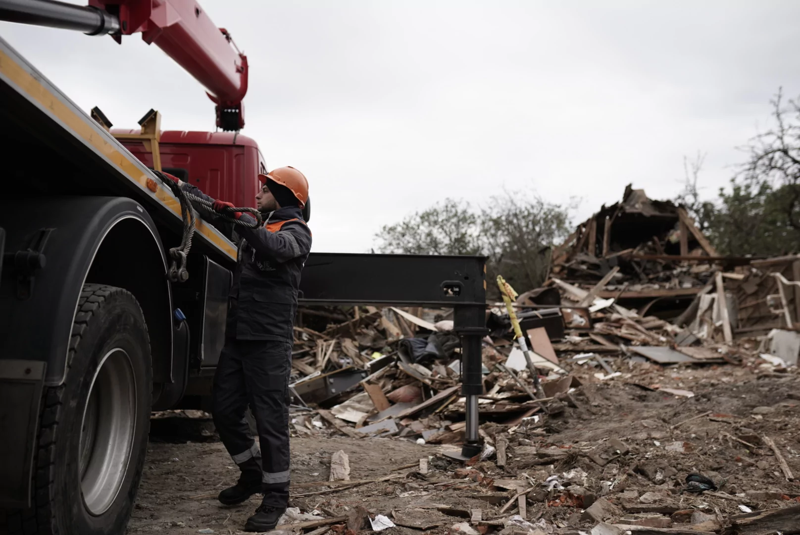 Municipal services cleaning the damage in the Saltivskyi district after Russian attack on Kharkiv on Oct. 1