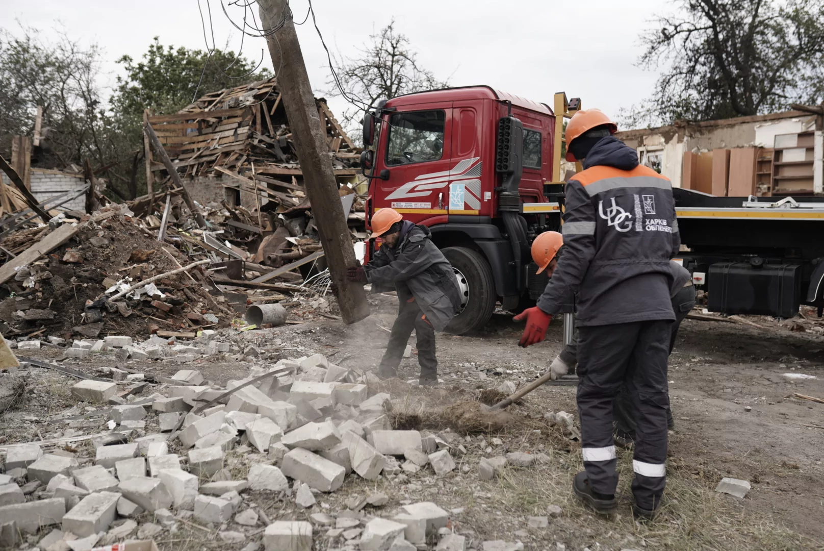 Municipal services cleaning the damage in the Saltivskyi district after Russian attack on Kharkiv on Oct. 1
