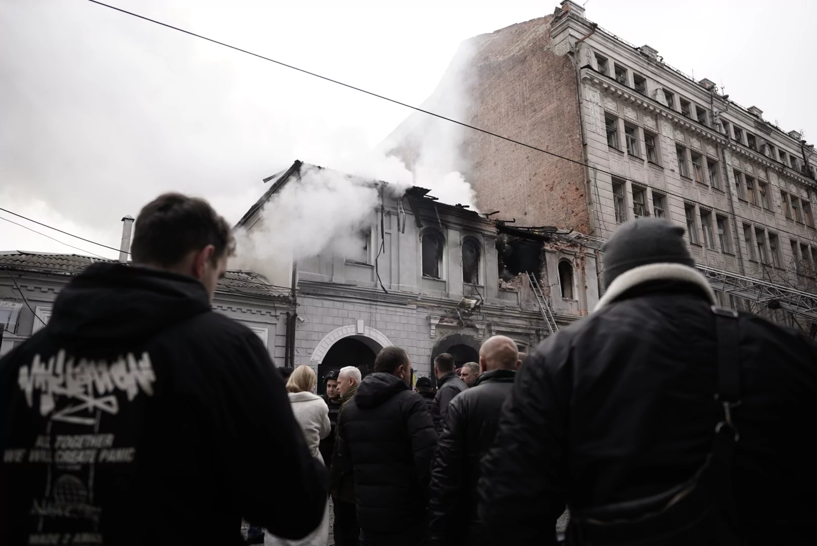 Crowd that gathered in front of kindergarten, burning in the aftermath of Russian drone strike