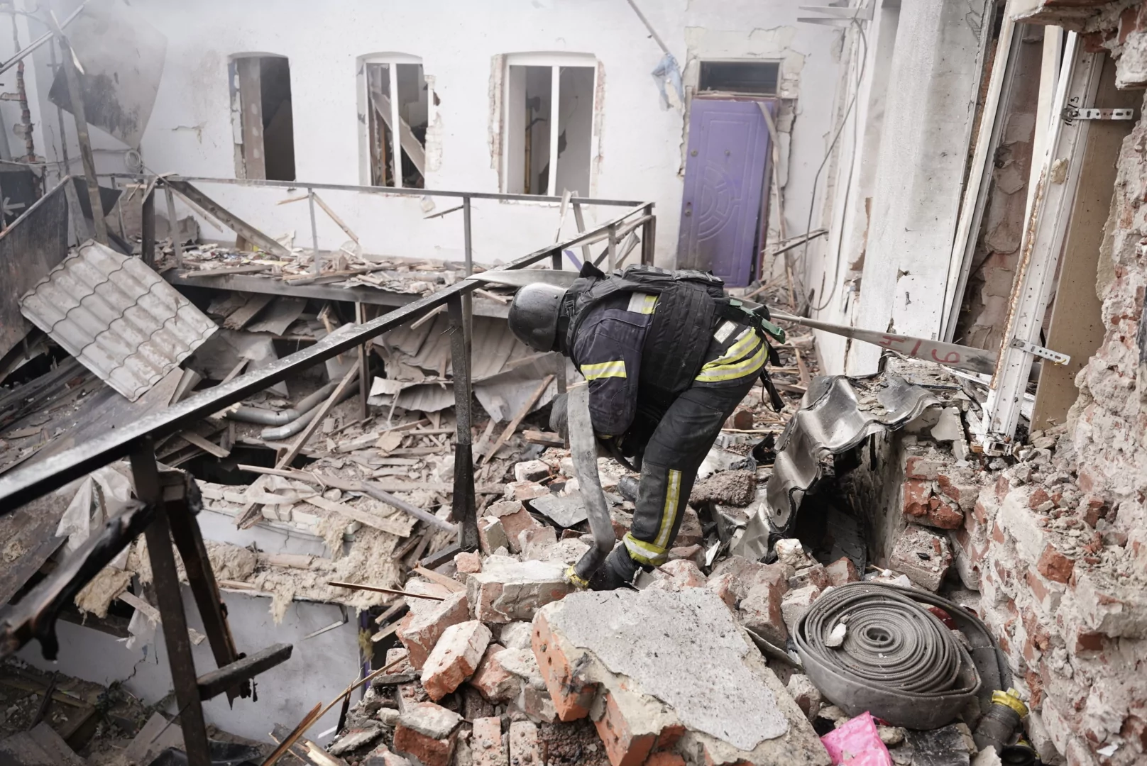 Kharkiv private kindergarten destroyed in Russian drone strike, with emergency workers working to put out fire