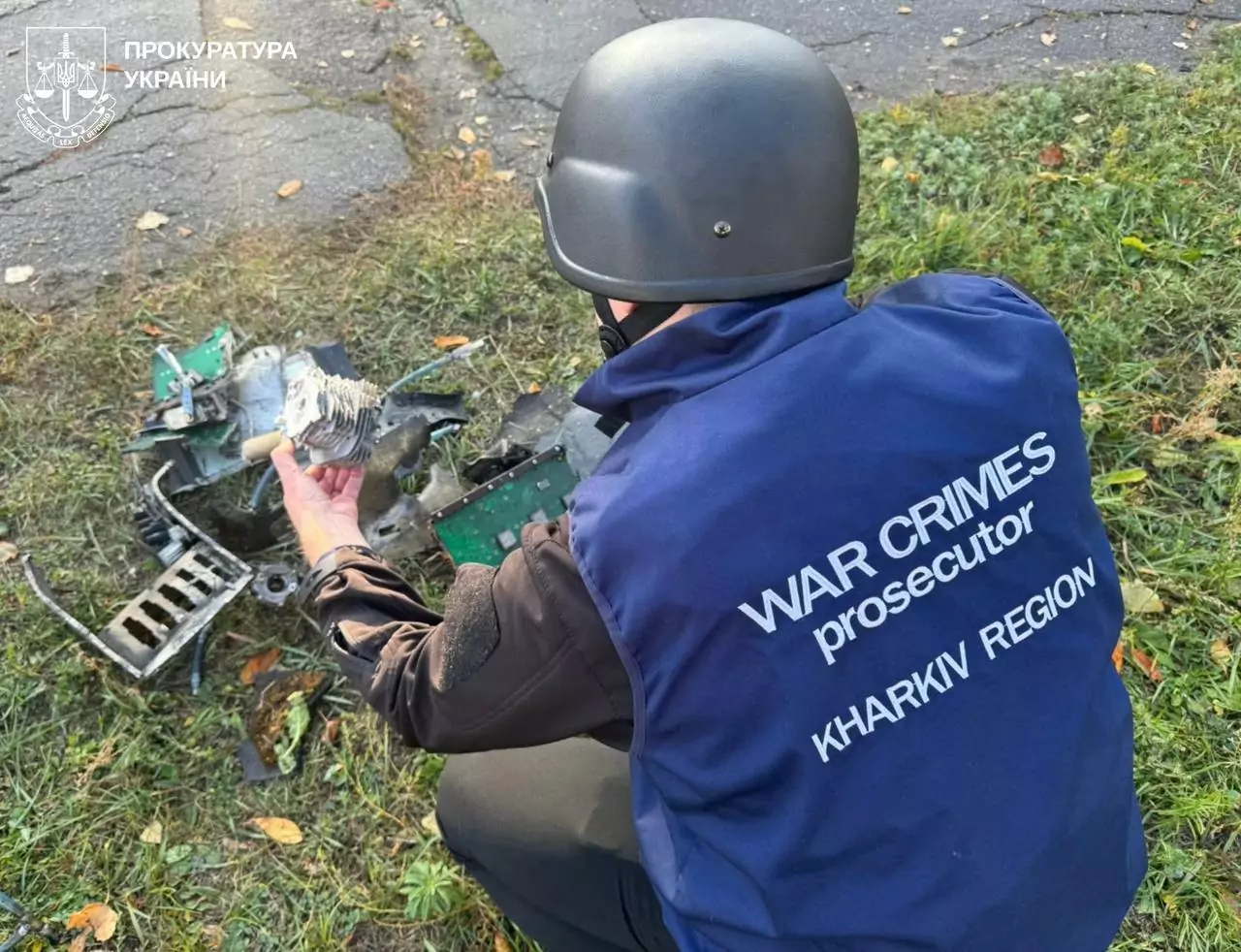 Prosecutor inspects debris from Russian drone after the attack on Kharkiv on Oct. 7