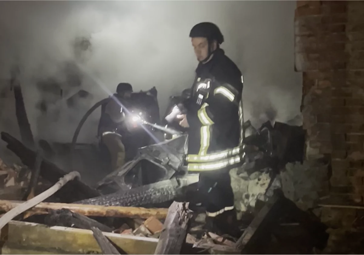 Emergency services putting out fire in the aftermath of Russian glide bomb attack on Kharkiv on Oct. 13, 2025 / Source: Screenshot from video, Nazar Hlamazda, Gwara Media