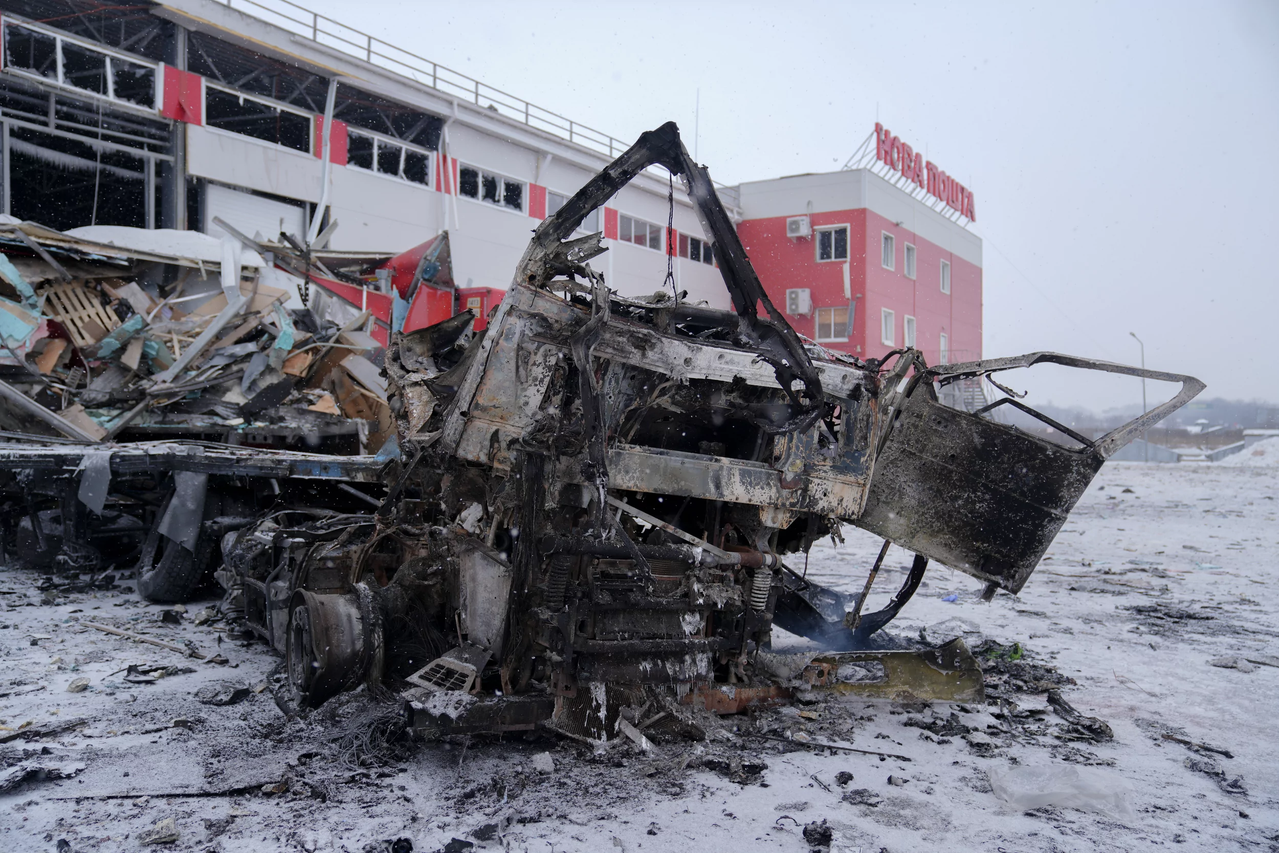 Damaged trucks of Nova Poshta after Russian attack on post service terminal in Kharkiv oblast