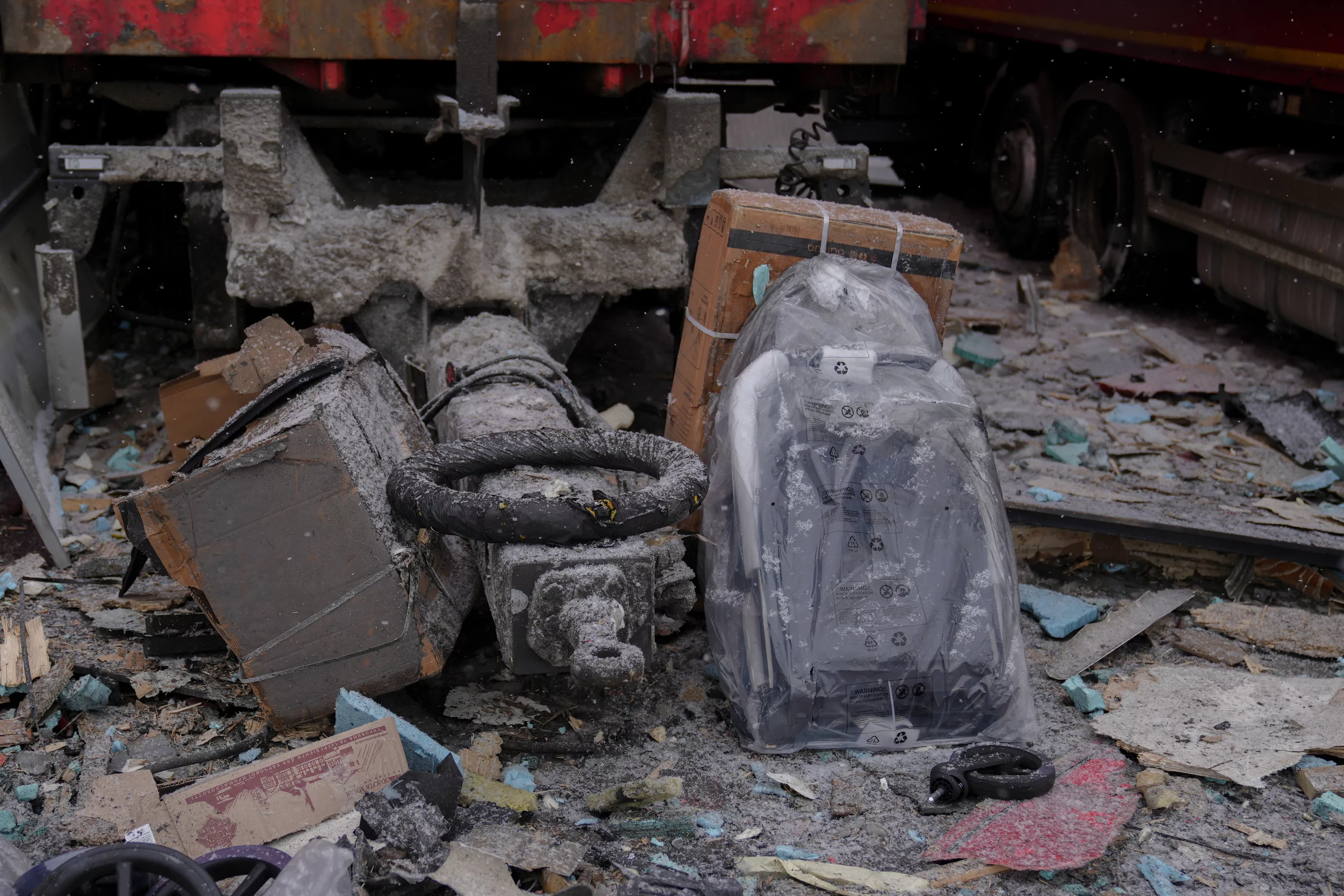 The photo of parcels in damaged trucks of Nova Poshta after Russian attack on post service terminal in Kharkiv oblast