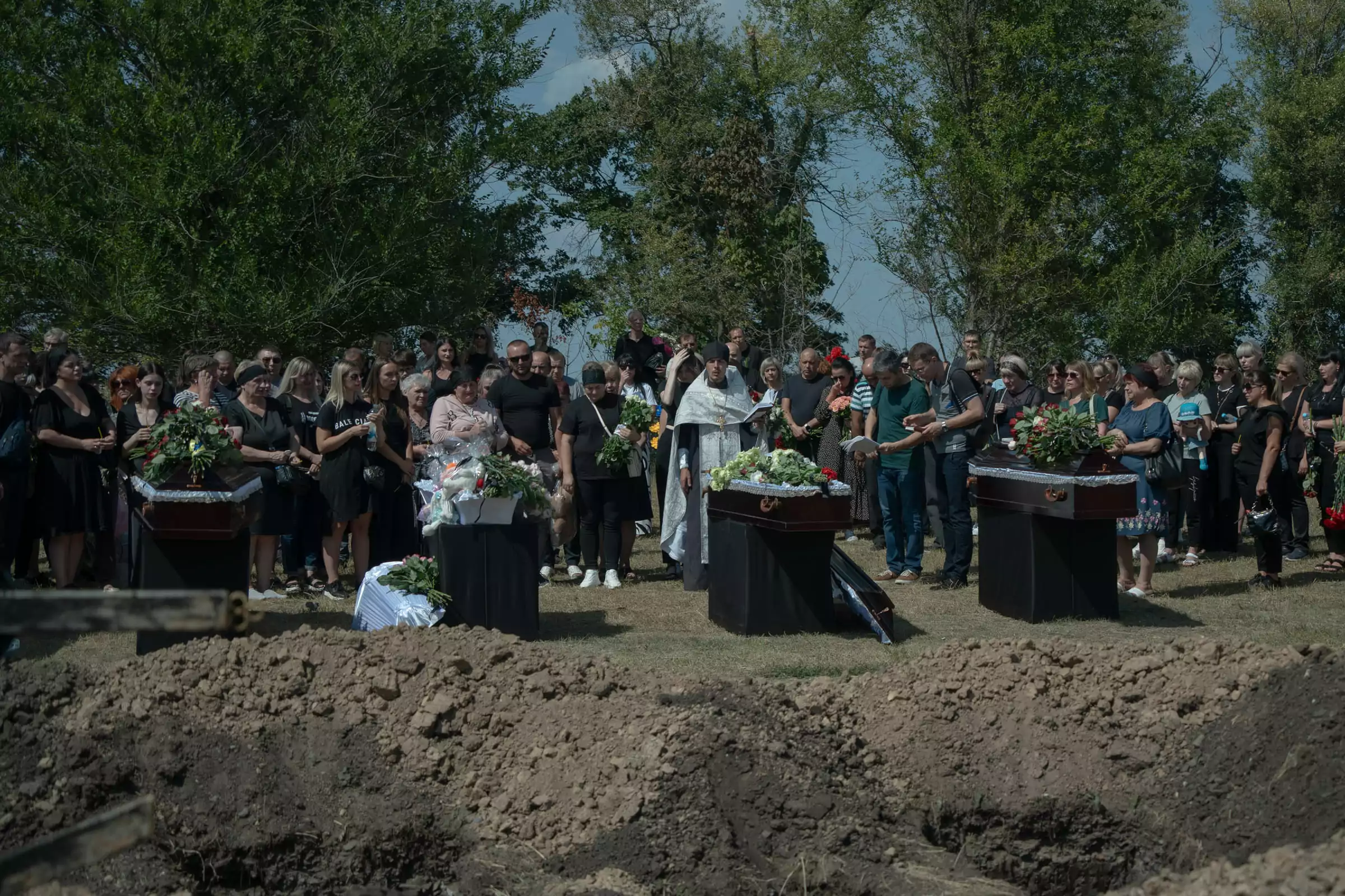 Funeral for the Serha-Morozovy family killed by Russian Shahed drones in the Industrialnyi district of Kharkiv. August 2025 / Photo: Gwara Media, Polina Kulish