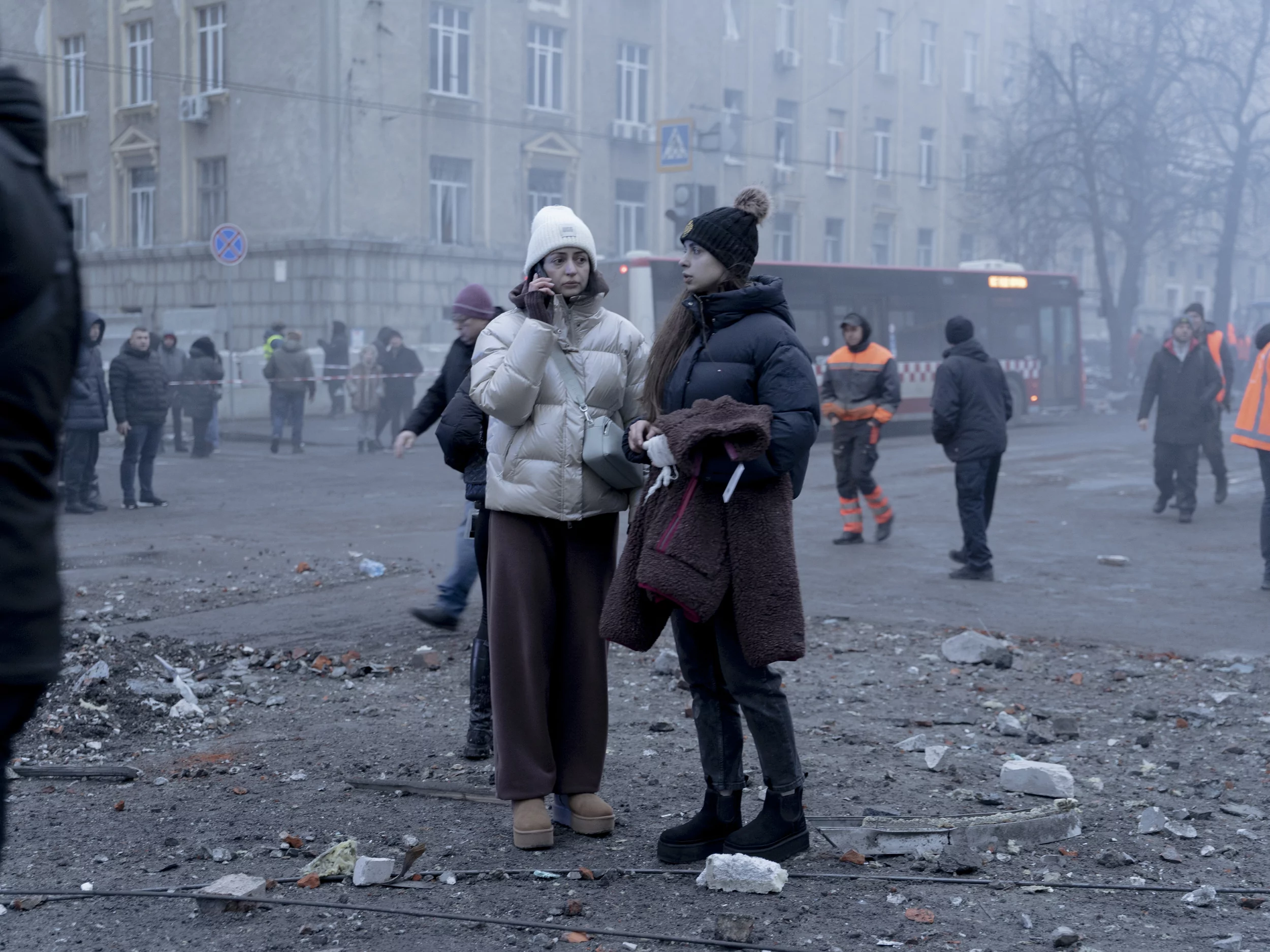Photo of injured locals on the street after the Russian attack on Kharkiv