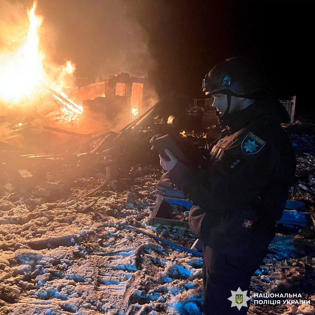 Police officer documents the consequences of the Russian attack on the Kharkiv oblast