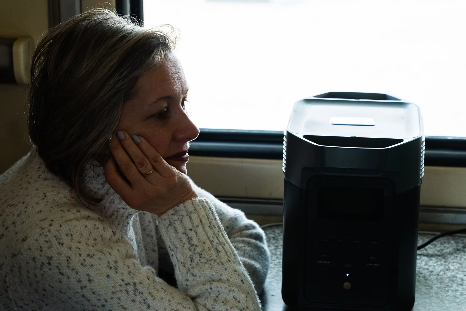 Woman with a battery-powered generator in "carriage of invincibility"