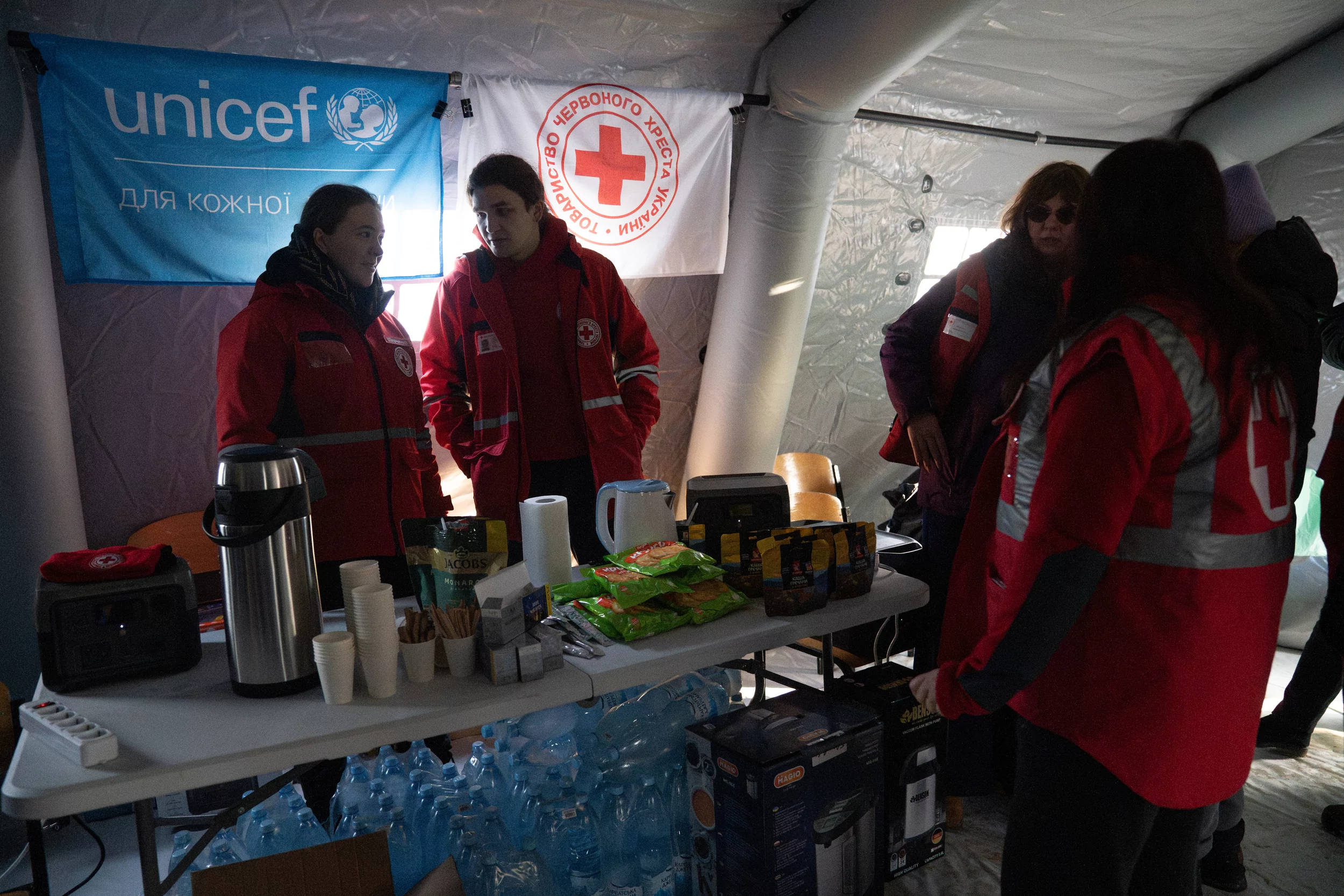 Red Cross workers on duty at a heating point in Kharkiv.