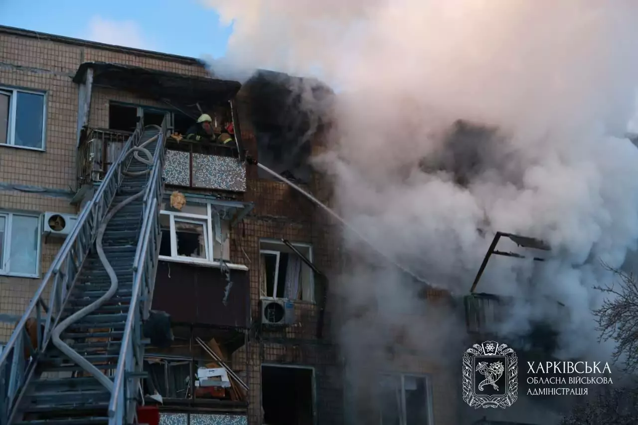 burning building in the aftermath of Russian drone strike on kharkiv