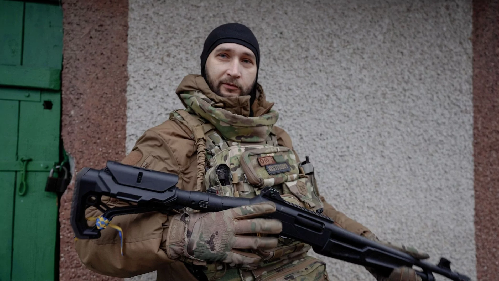 Ihor, one of the White Angel's officer, holds the rifle