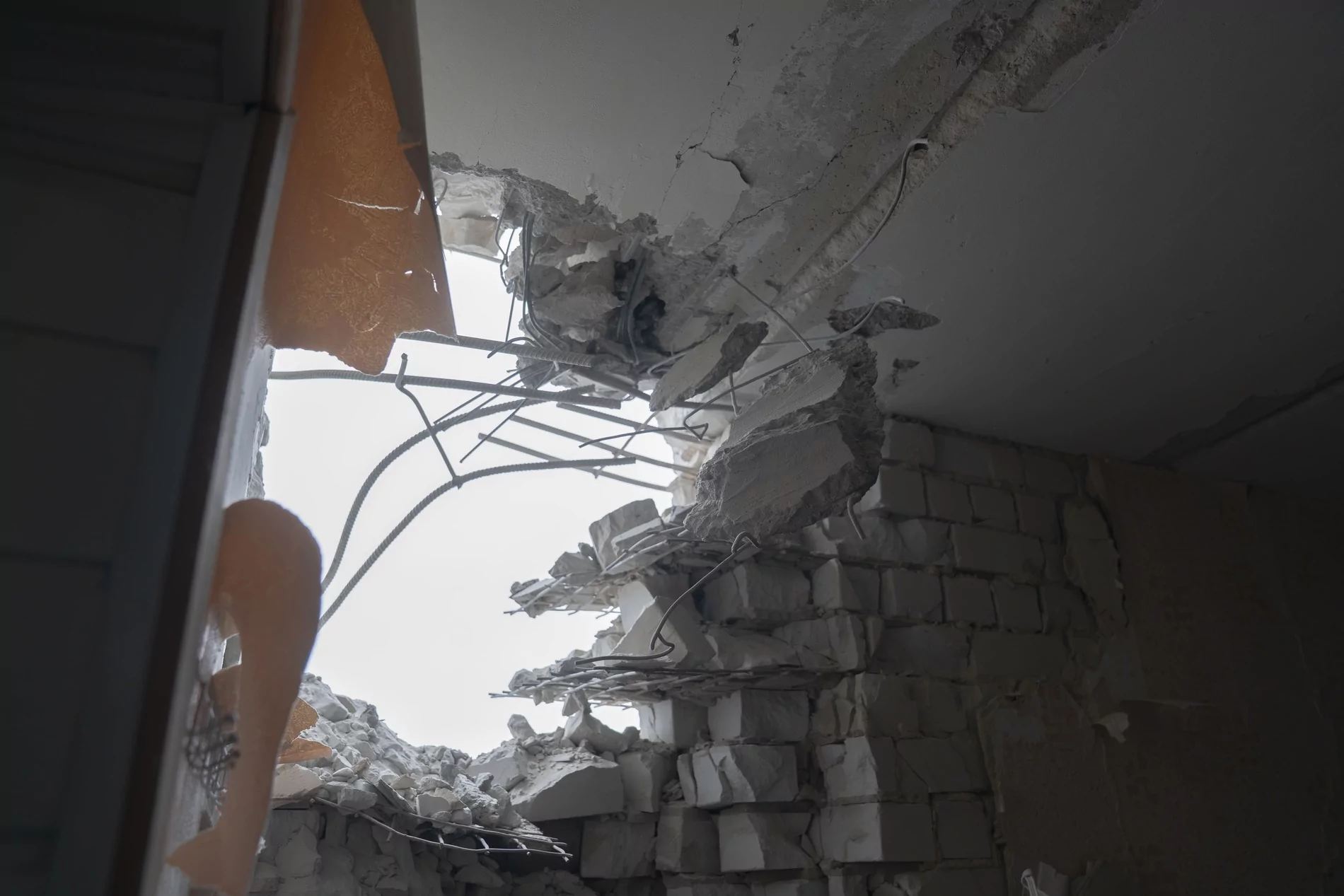 Damaged wall in the room next to Vasyl's