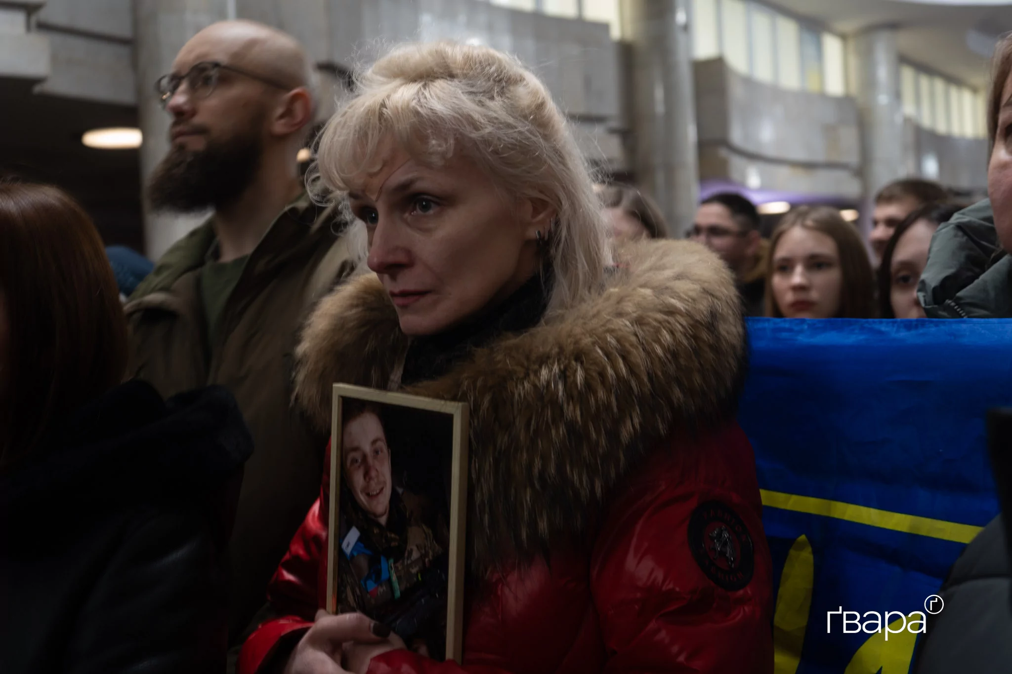 A woman holding a picture of her son at the joint prayer on Feb. 22, 2026 / Photo: Gwara Media, Yana Sliemzina