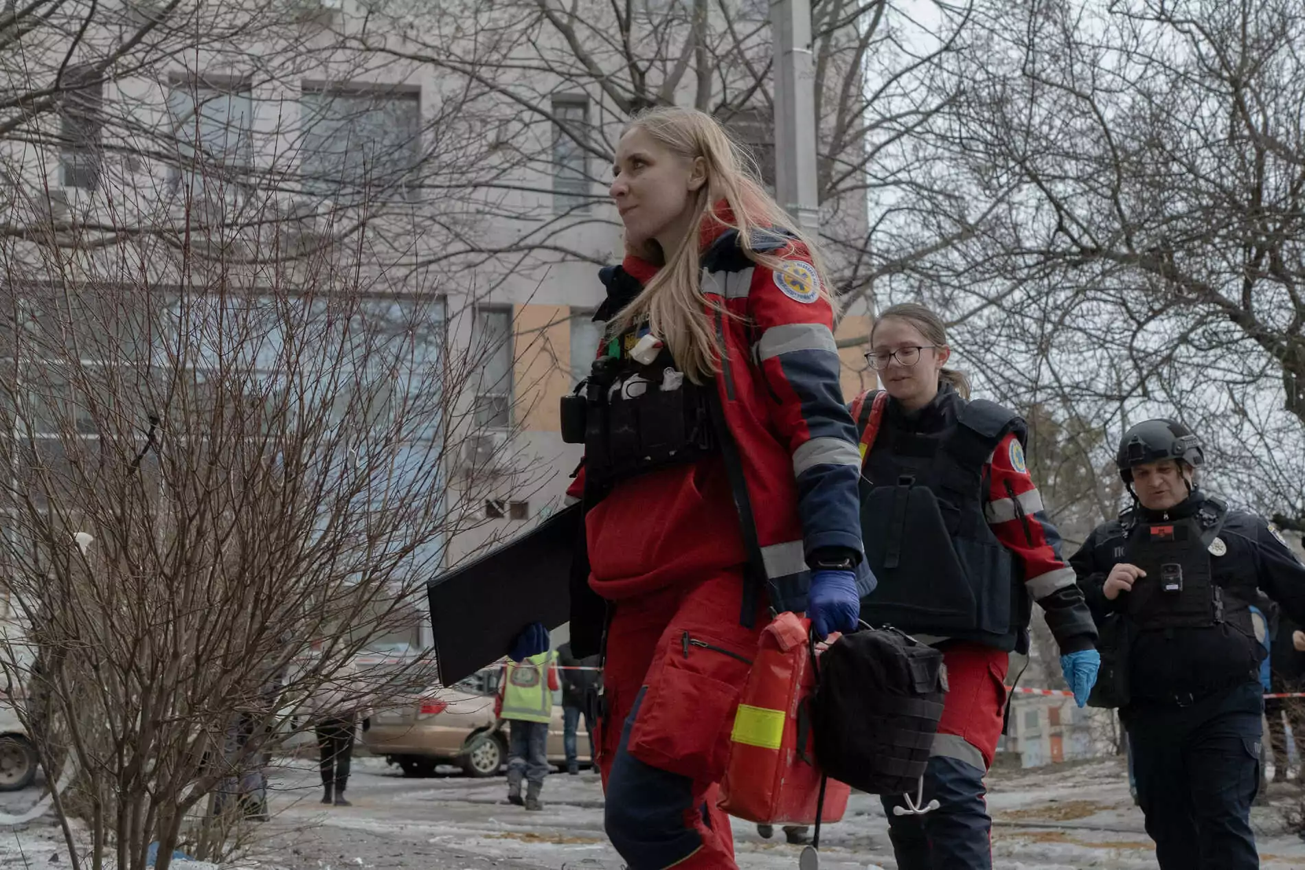 Medical workers at the impact site after the Russian attack on Mar. 2