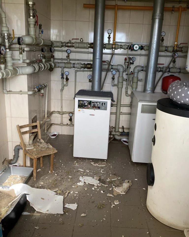Damaged heating equipment in animal shelter after Russian attack
