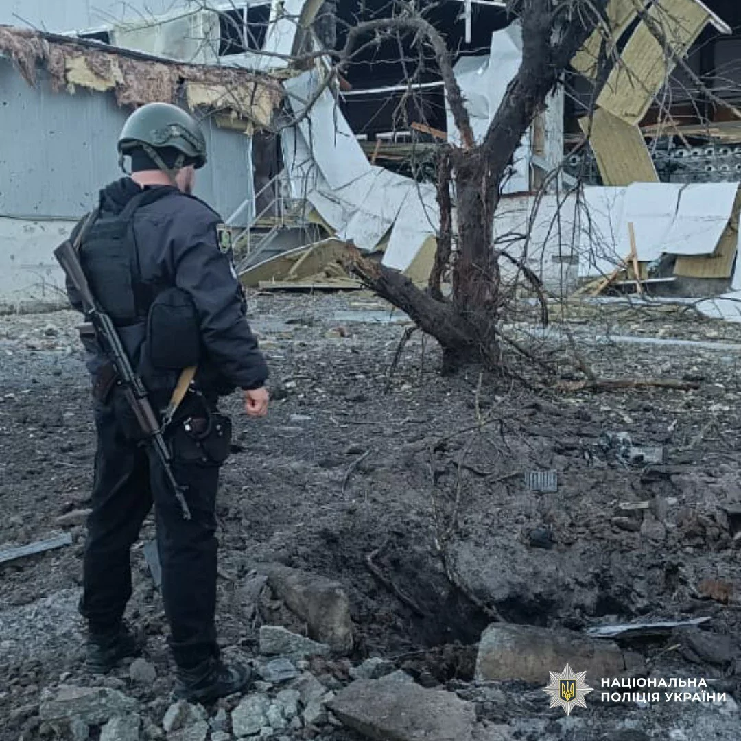 The Kharkiv regional police officer investigates the consequences of Russian attacks.