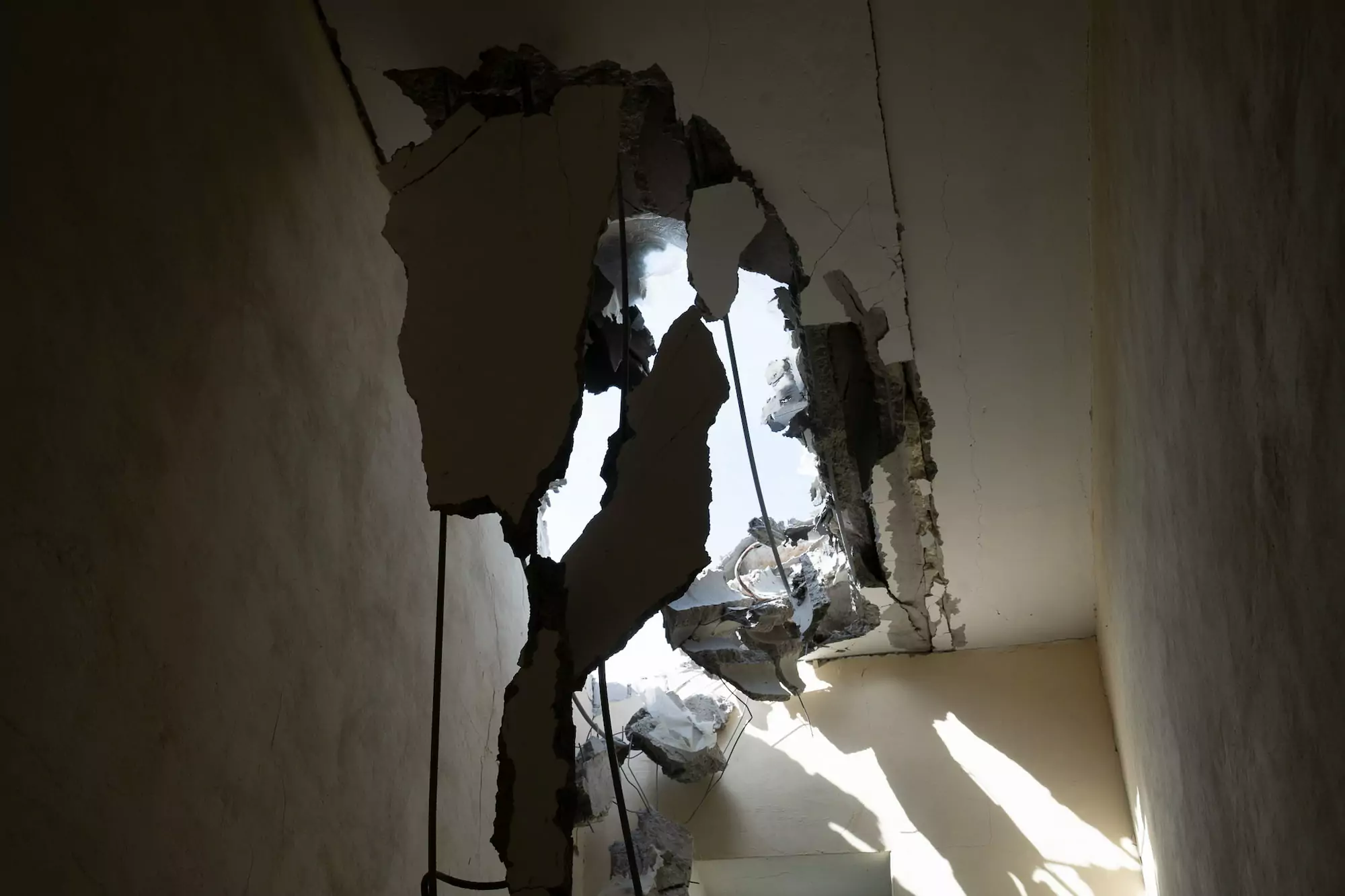 Damaged roof of the apartment building after Russian attack on Kharkiv