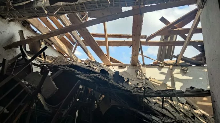 Russian drone attack damage building of Humanitarian Aid Center in Kharkiv oblast